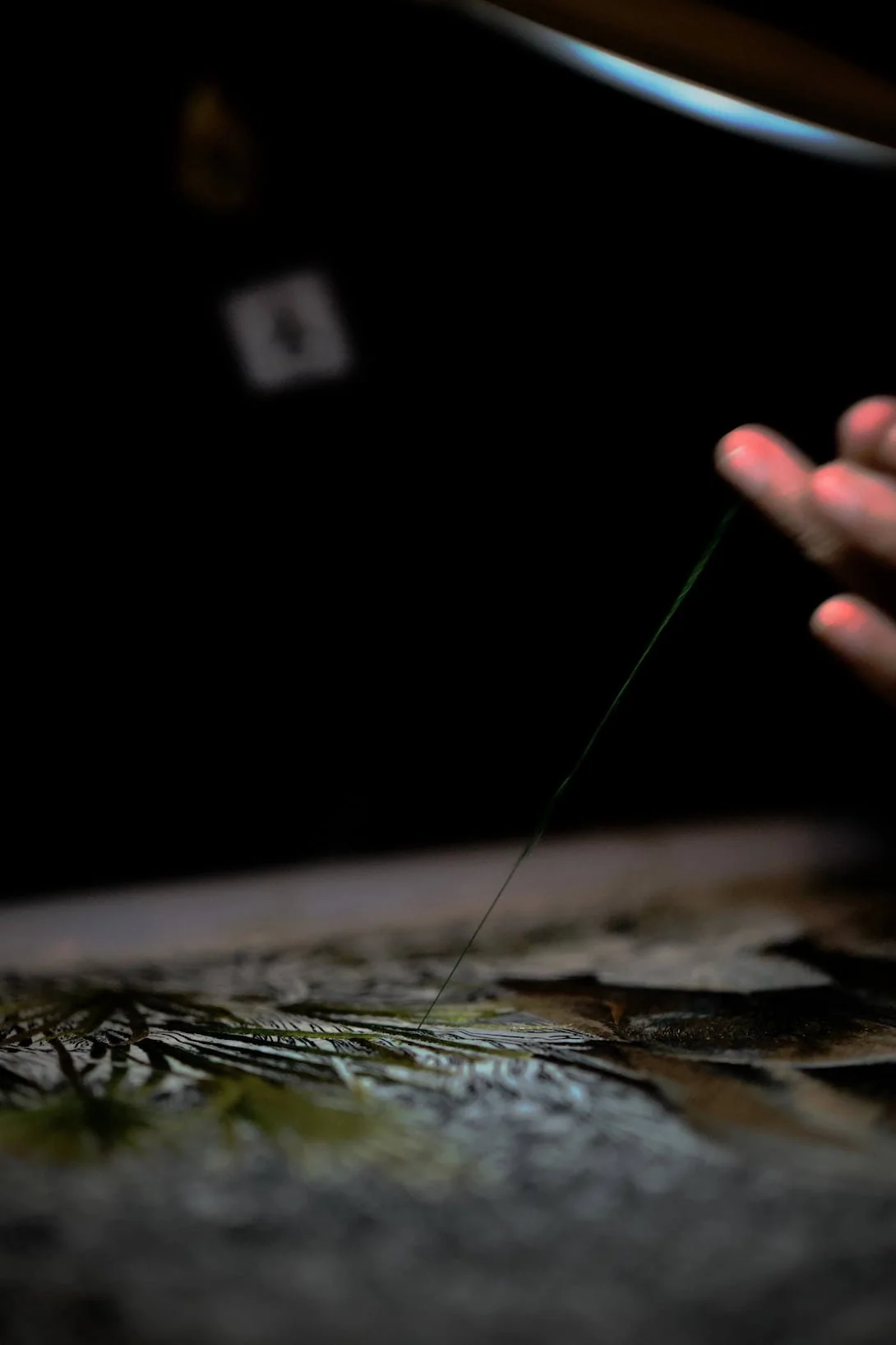 Fine Thai craft showing thin silk thread mimicking the delicate and crips hair strokes of nano brows at URADIANT Sydney