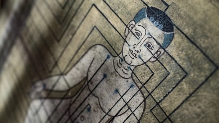 An illustration of a child's face, an traditional thai wall art.