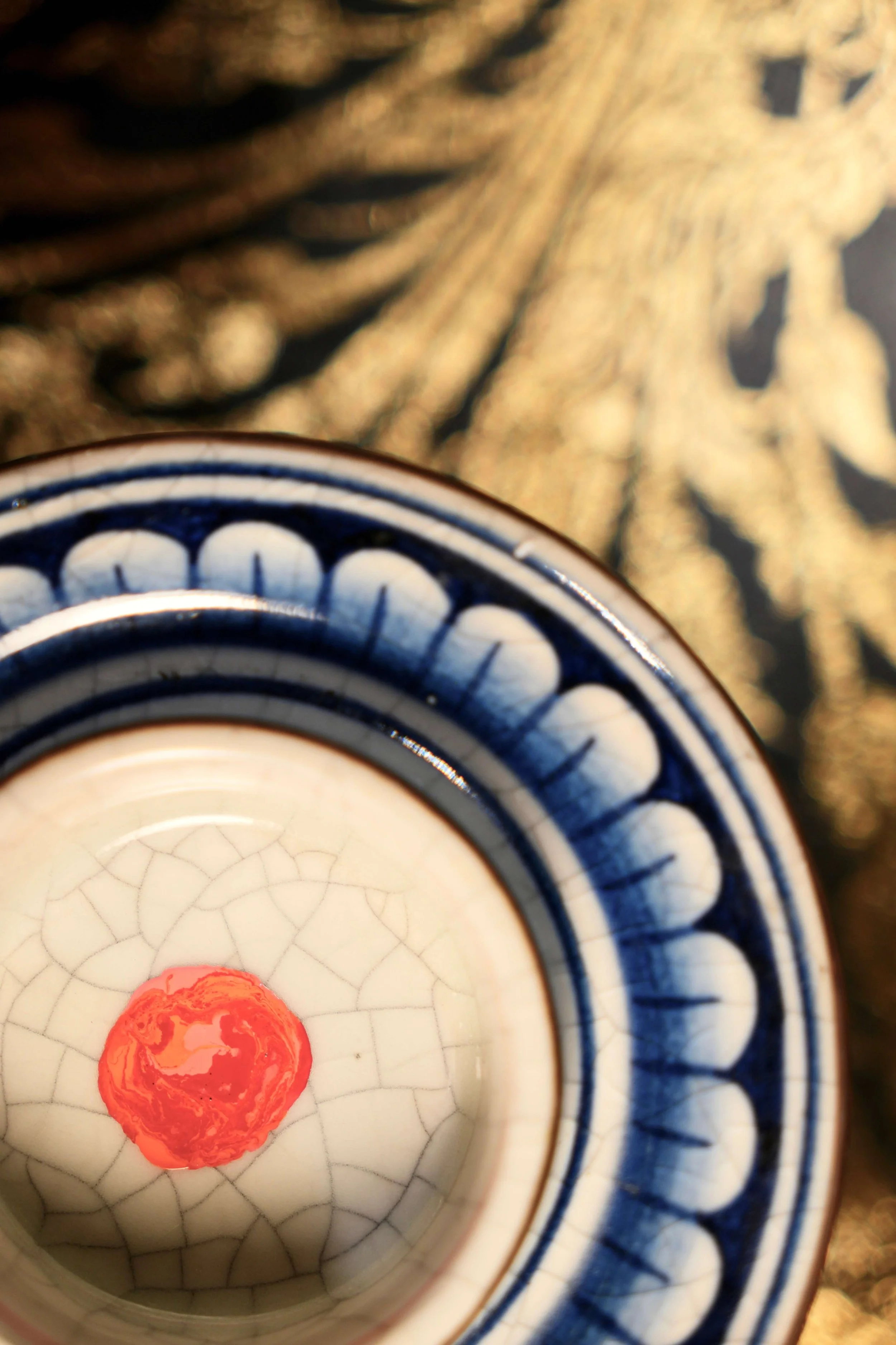 The blend of corrective, pink and red pigments in the thai ceramic - the neutralisation technique used to customise and correct dark lips at URADIANT