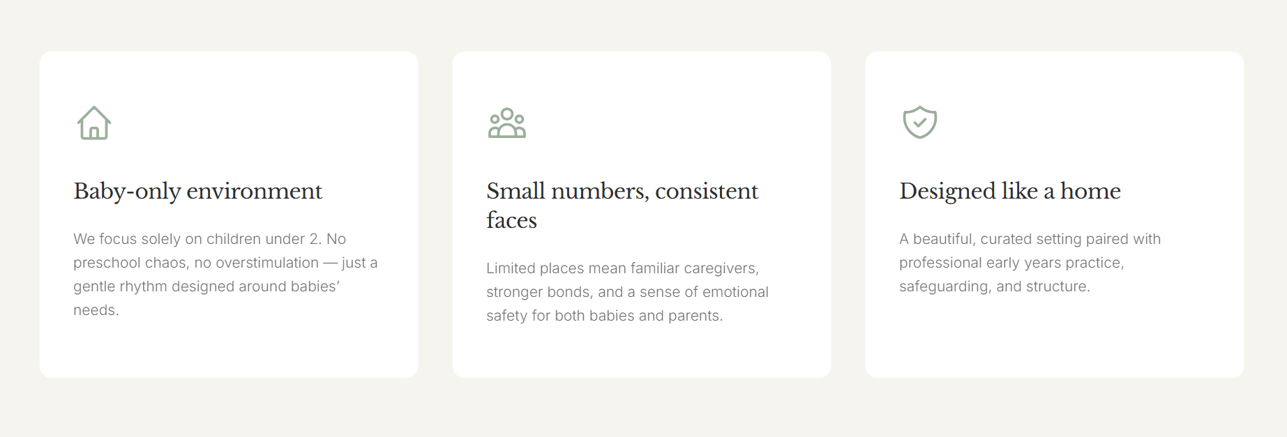 Three informational cards with icons and text about child care. The first card has a house icon and discusses a baby-only environment. The second card has a group icon and talks about small groups with consistent faces. The third card has a shield icon and describes a home-like, professionally designed setting.
