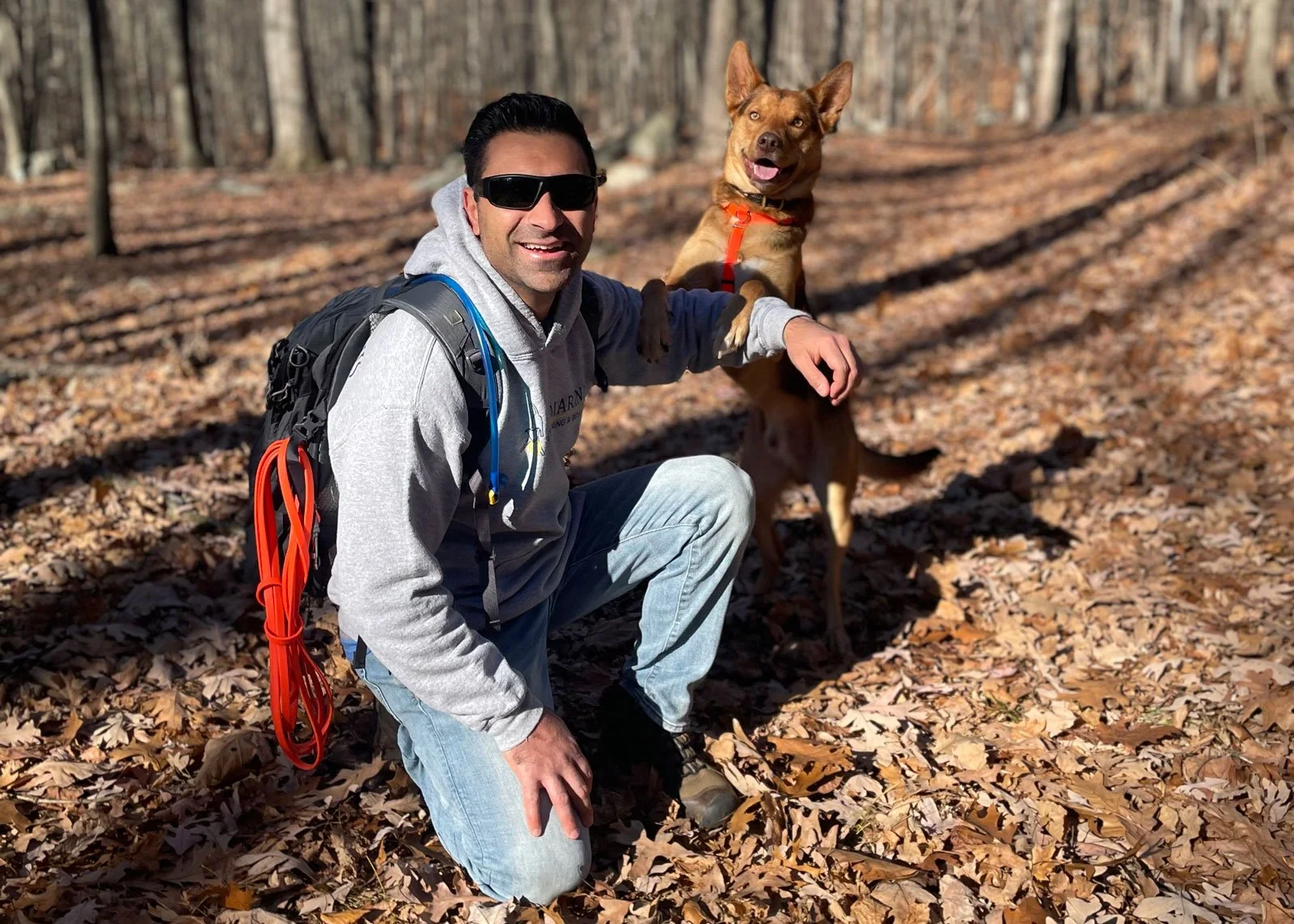 Anthony and Journey off leash in the woods