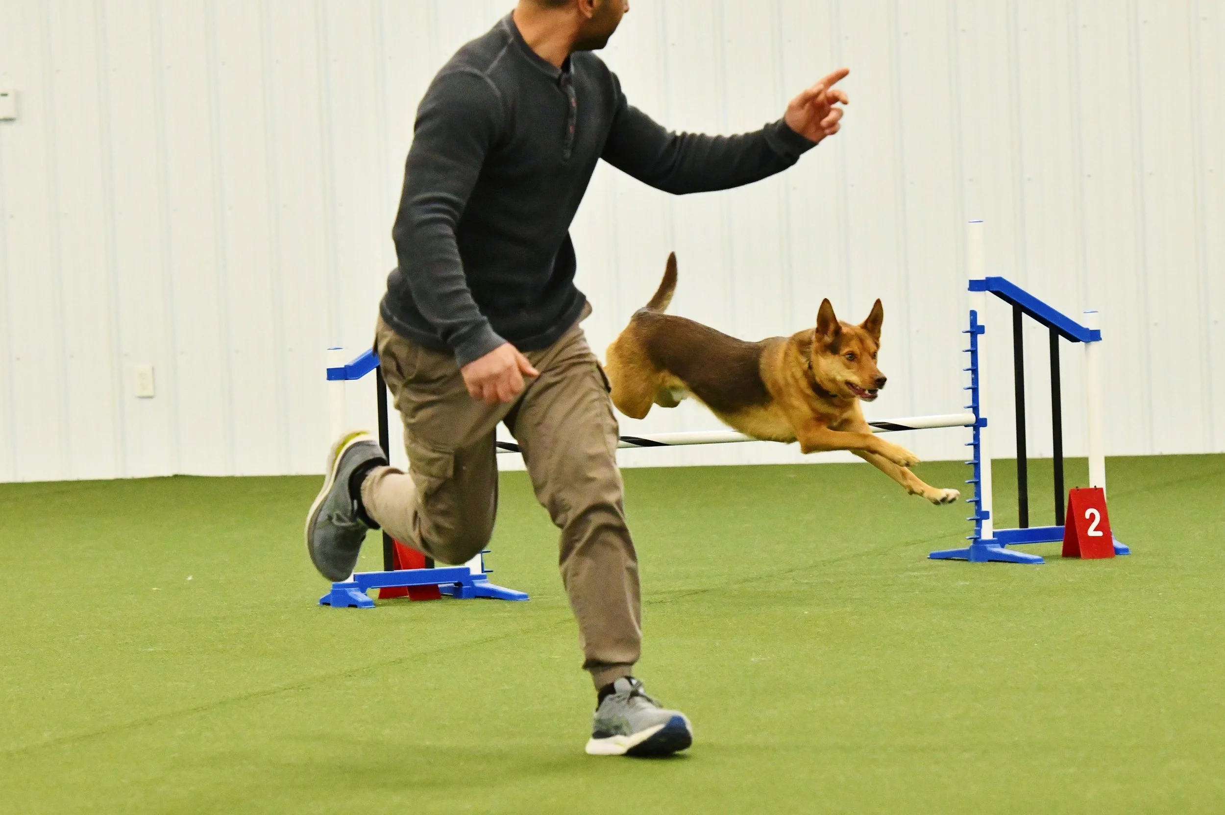 Journey and Anthony at an agility competition