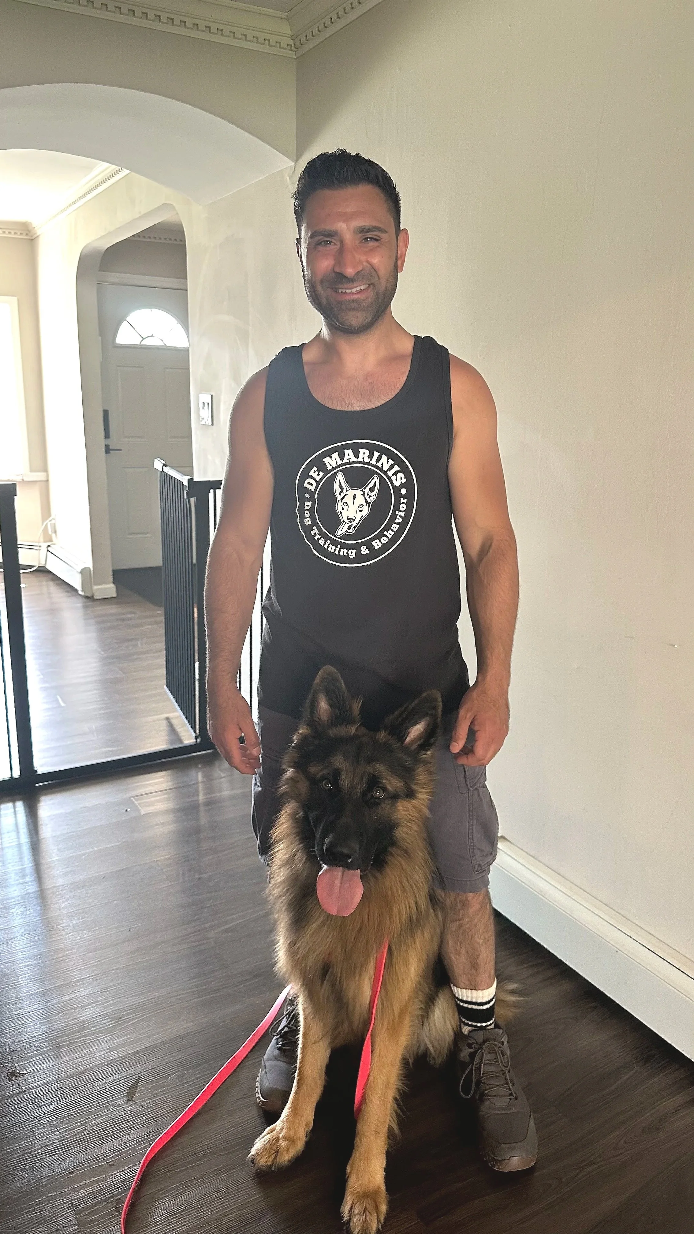 Anthony and Zammy a German Shepherd after a training session
