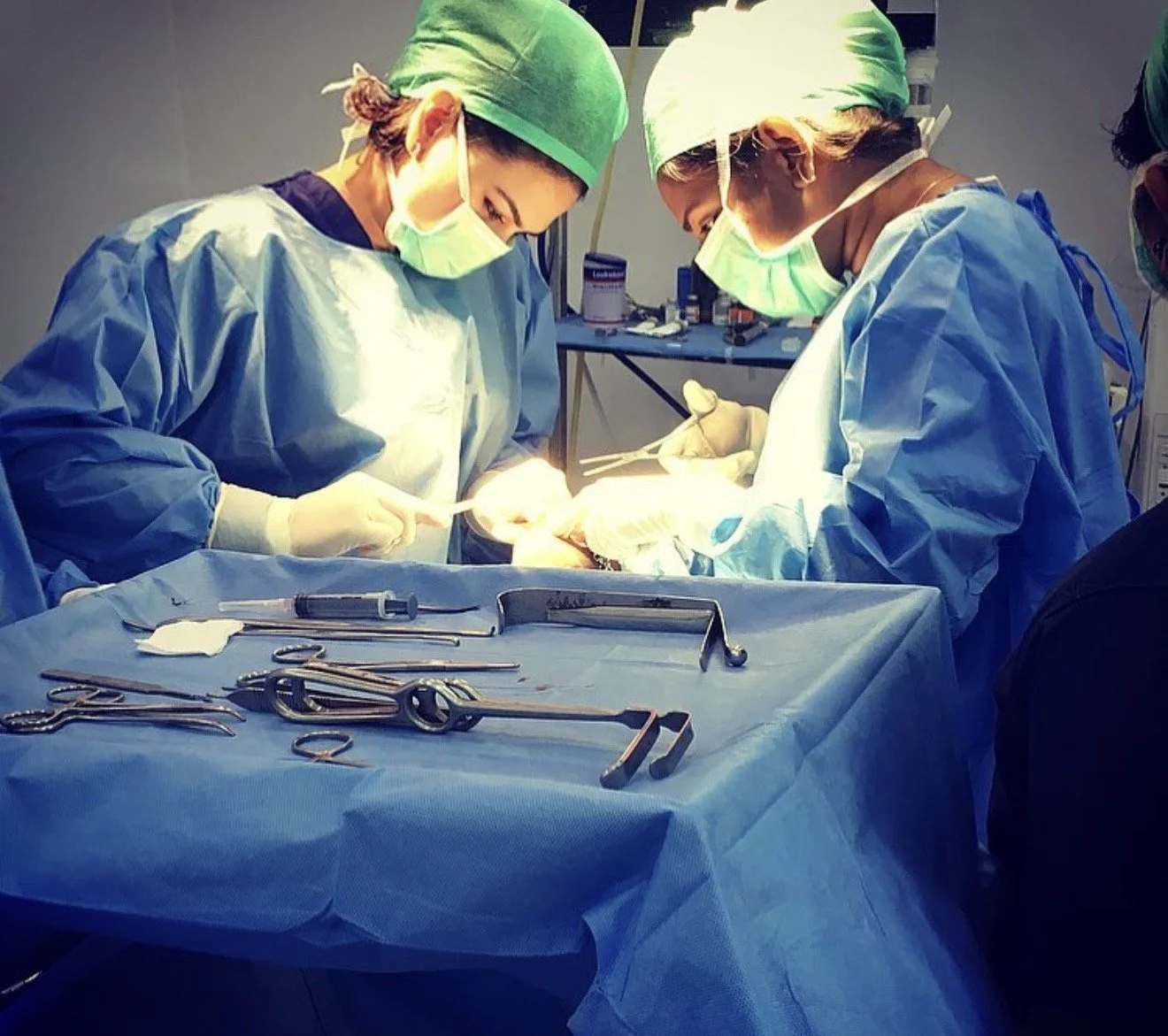 Advanced medical procedure performed by trained clinicians in a controlled surgical setting at Nouvelage Aesthetic Clinic.