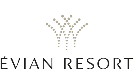 Logo for Evian Resort with stylized tree and text.
