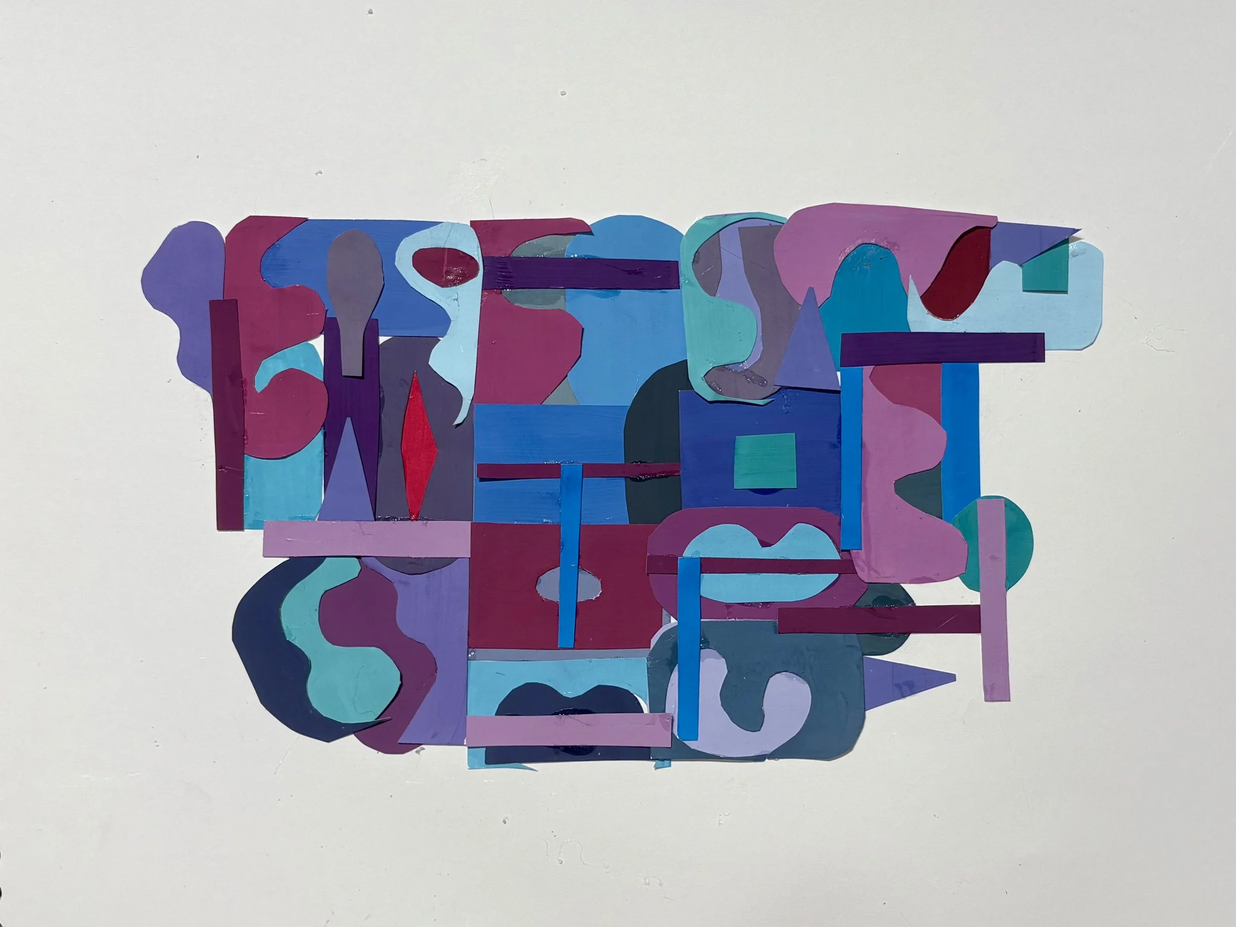 abstract geometric collage with various shapes and colors, including purple, blue, red, pink, and turquoise, arranged randomly on a white background.