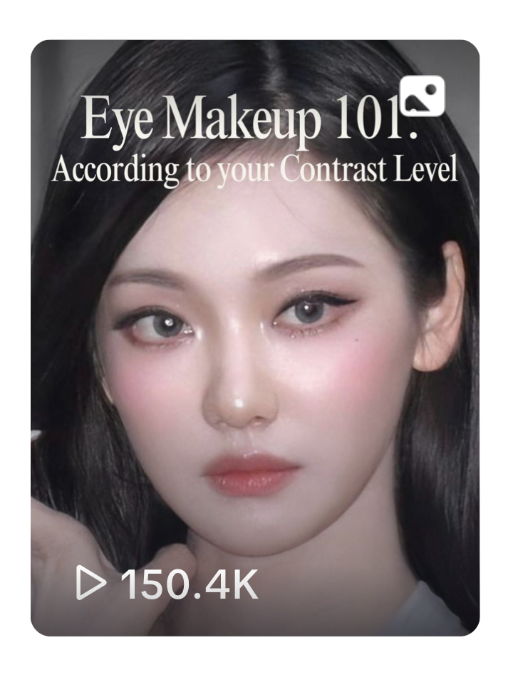 Thumbnail of a video titled 'Eye Makeup 101: According to your Contrast Level.' It features a close-up of a woman with eye makeup, including eyeshadow and eyeliner, and a play button with '150.4K' views.