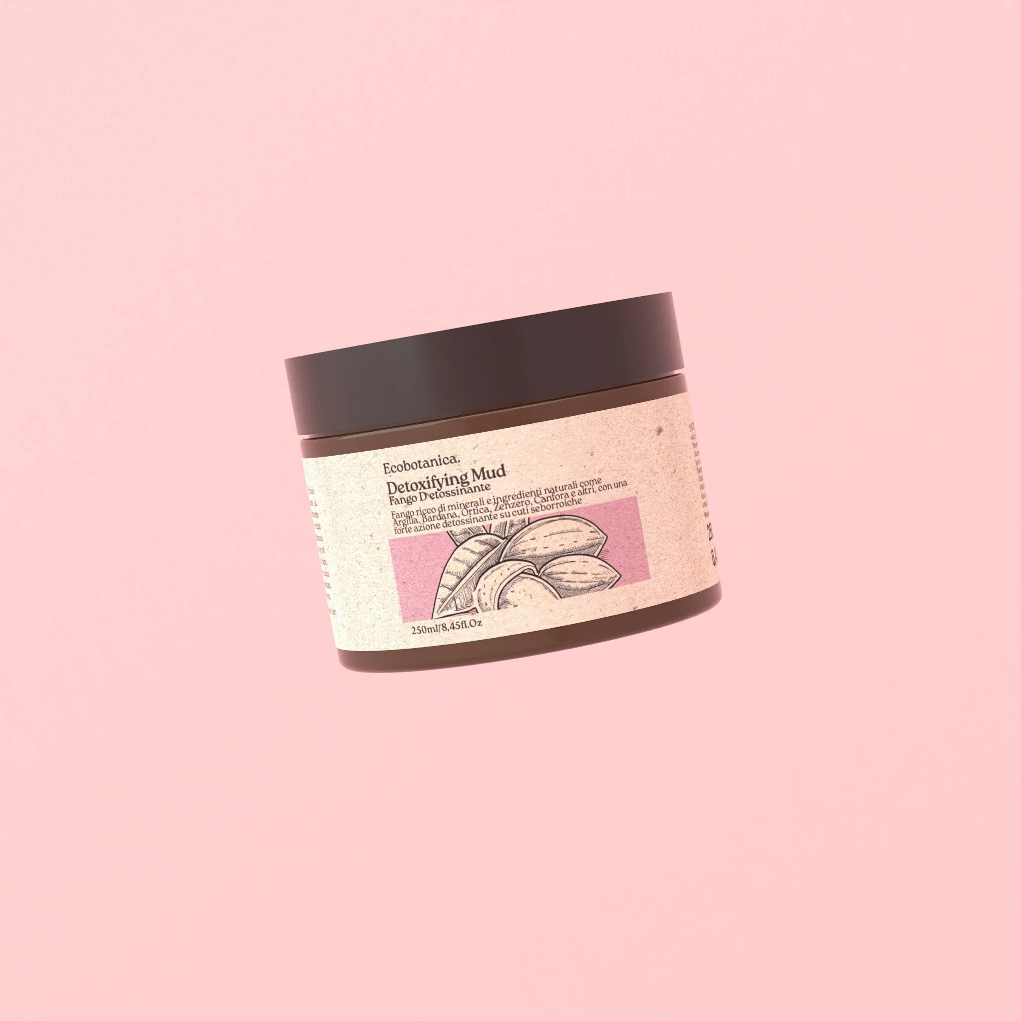 Contenitore di crema per il viso su sfondo rosa.