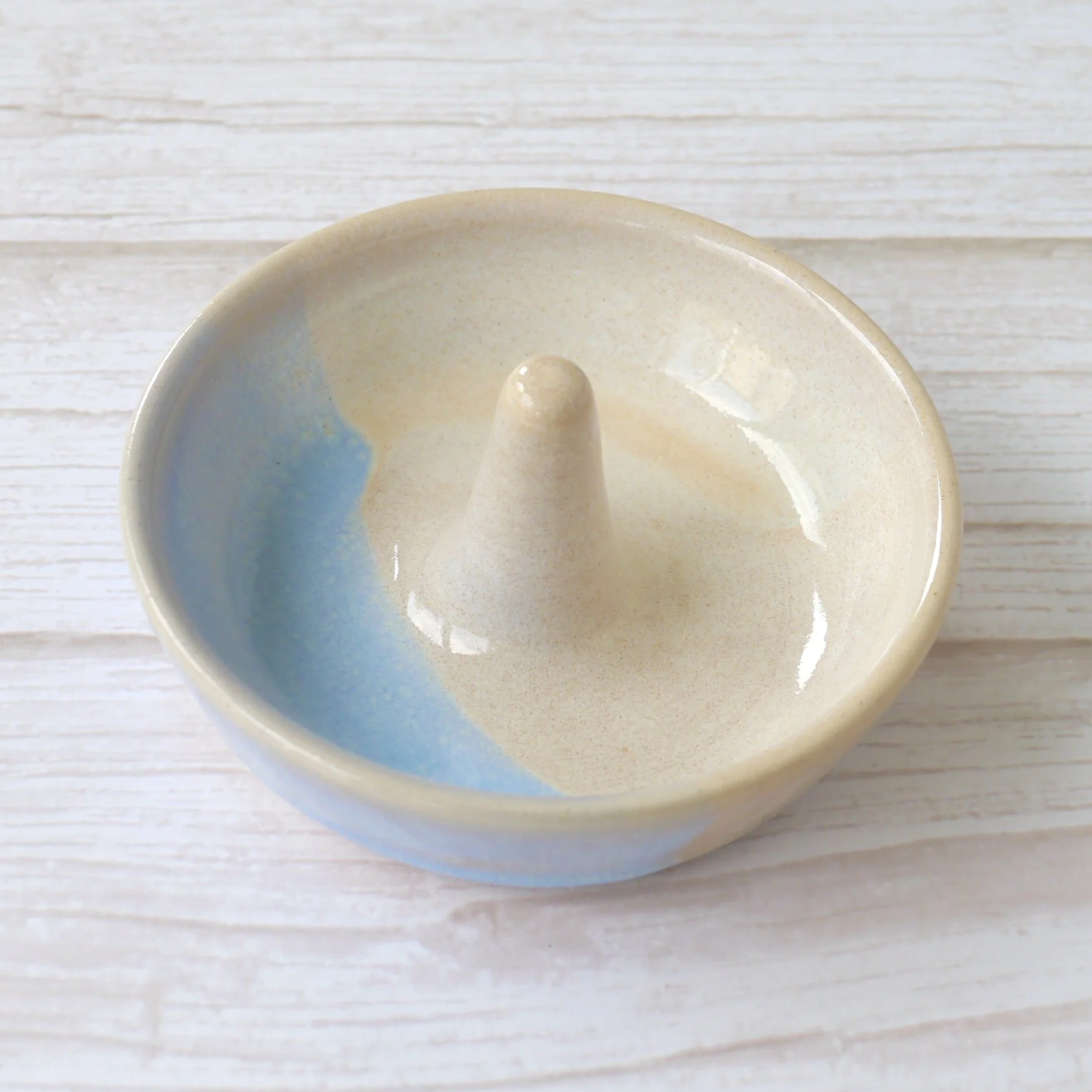 Hand-thrown stoneware ring dish. Each dish is lovingly crafted on my potter’s wheel from premium white stoneware clay and finished with a beautiful blend of beige and blue glazes.