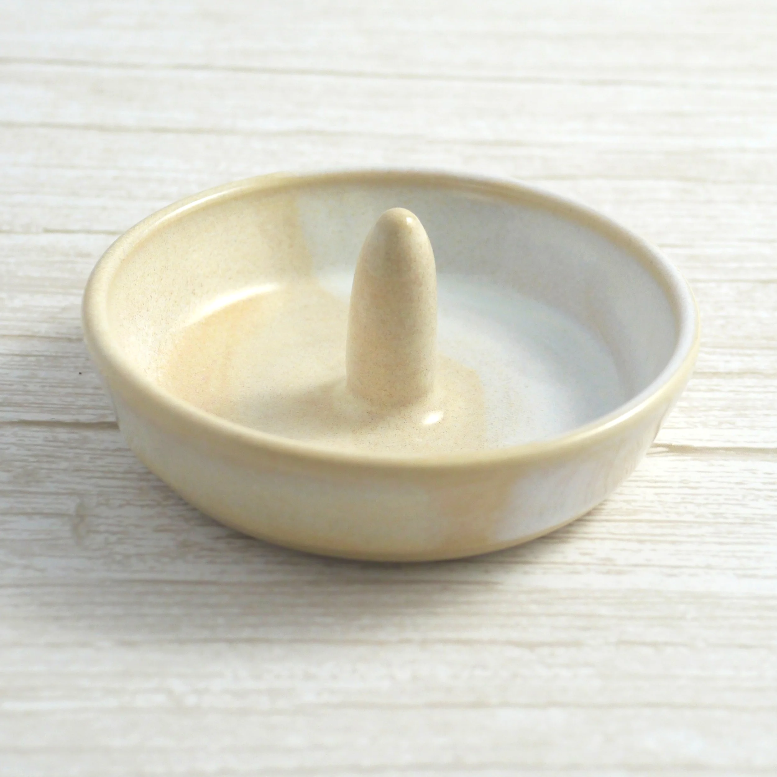 Handmade ring dish. Each dish is lovingly crafted on my potter’s wheel from premium white stoneware clay and finished with a beautiful blend of beige and white glazes.