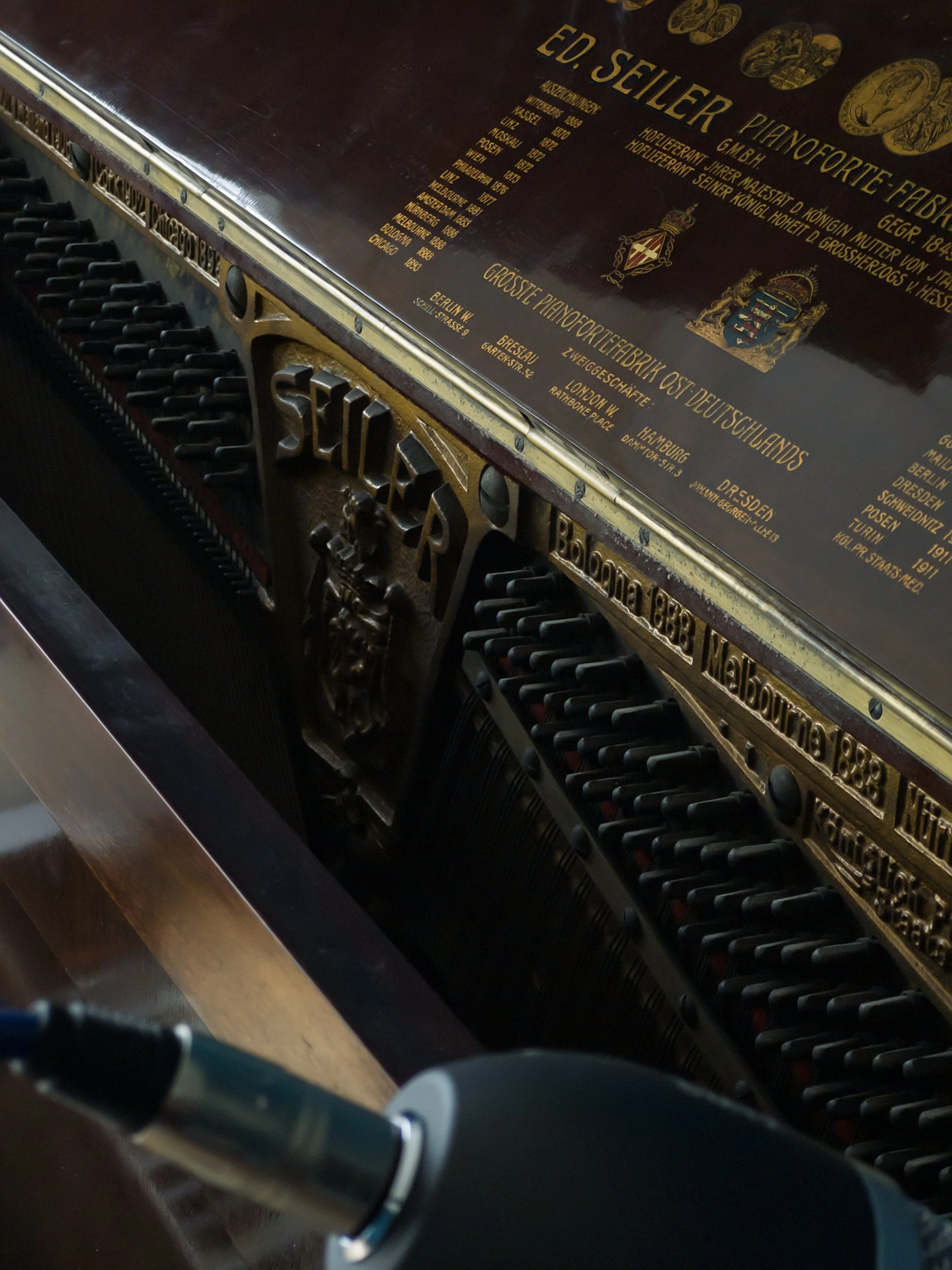 Close up of the interior details of the piano.