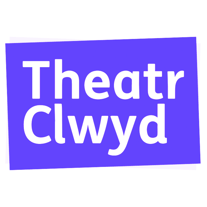 Stylized purple sign with white text that reads 'Theatr clwyd', located at an angle.