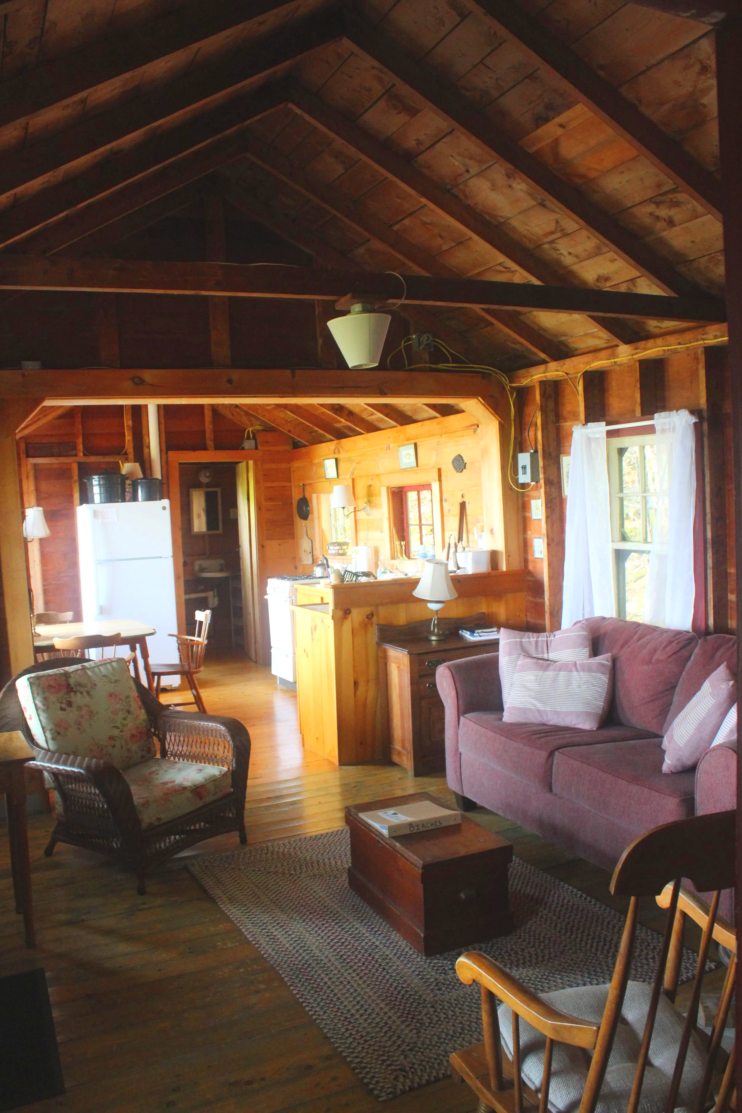 Living room looking toward kitchen and bathroom