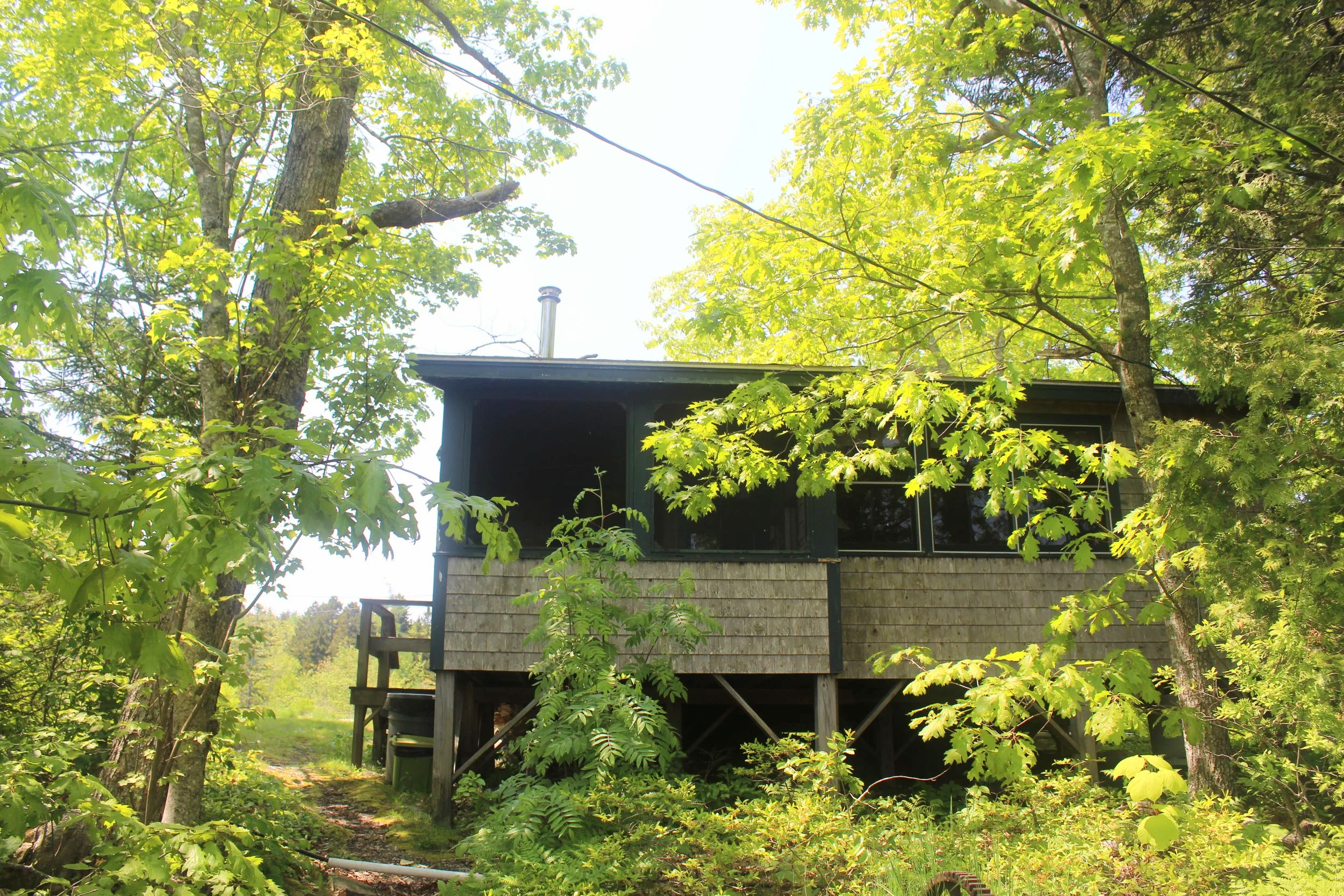 Back side of cottage facing the water