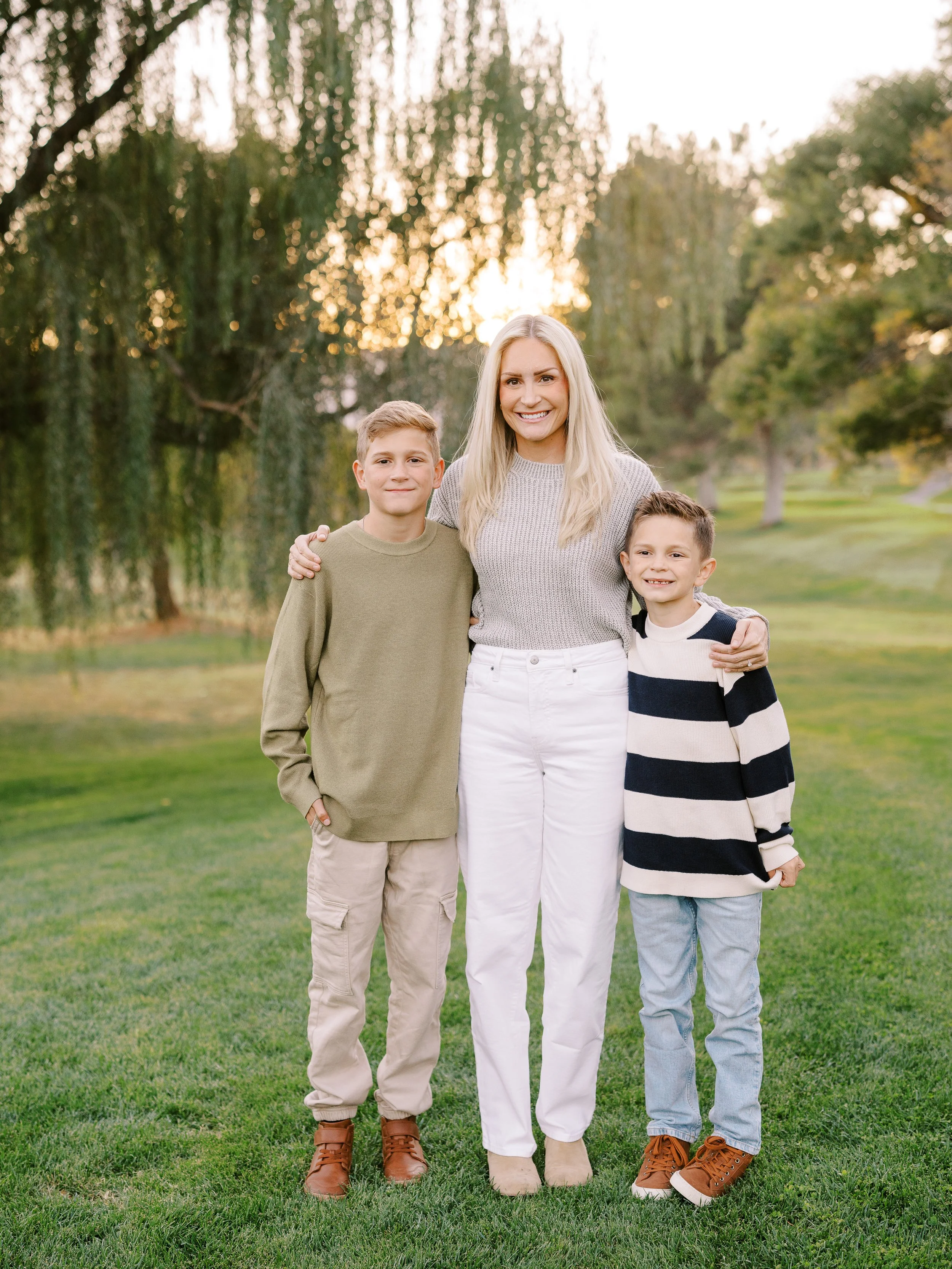 Mother standing with her two sons during the family mini session