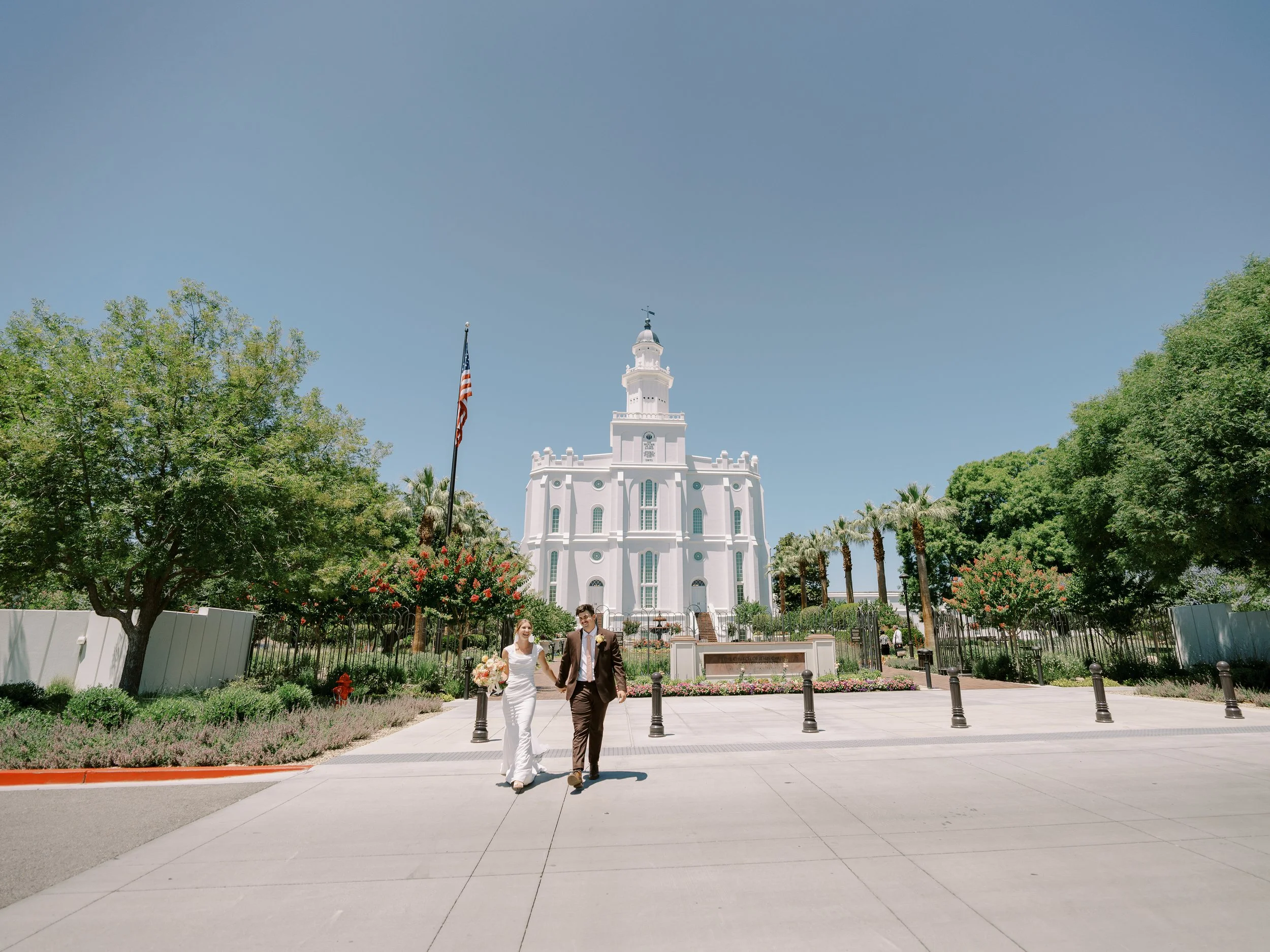 Wide view of Abby and Noah in front of the St. George Temple