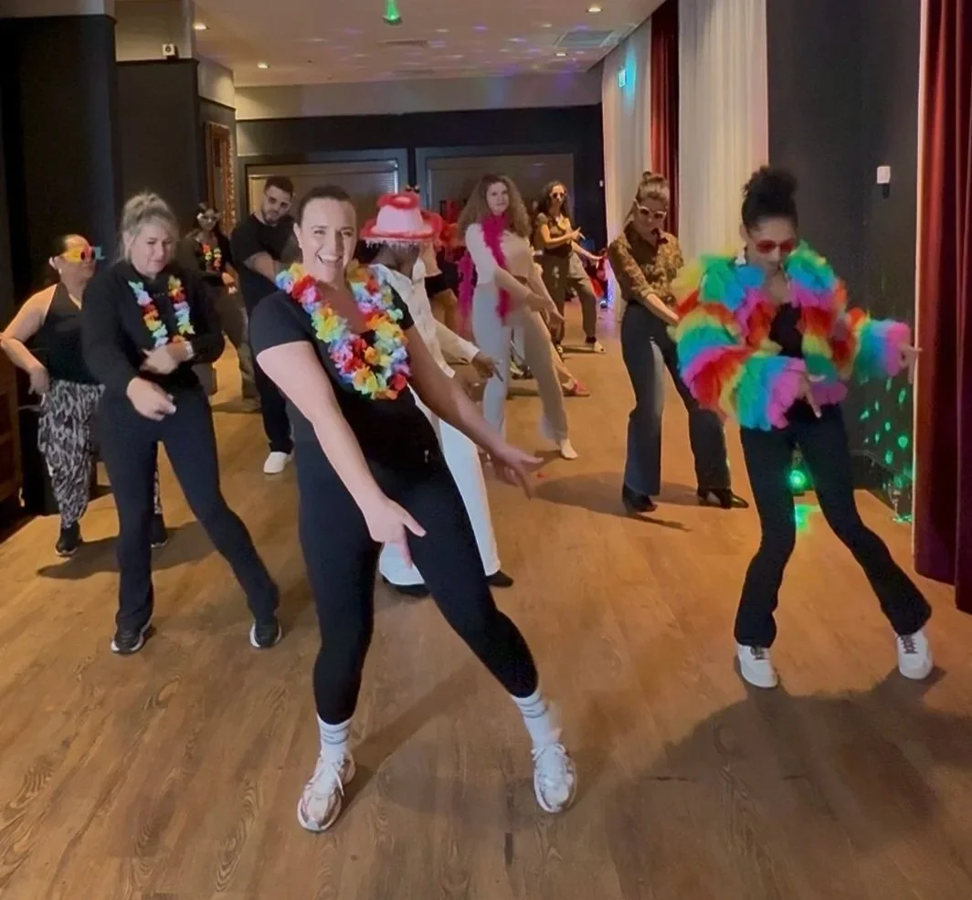 Feel good uplifting line dance class with Dazzle Dance Experience dancing to Puff Daddy fun group dance fitness activity