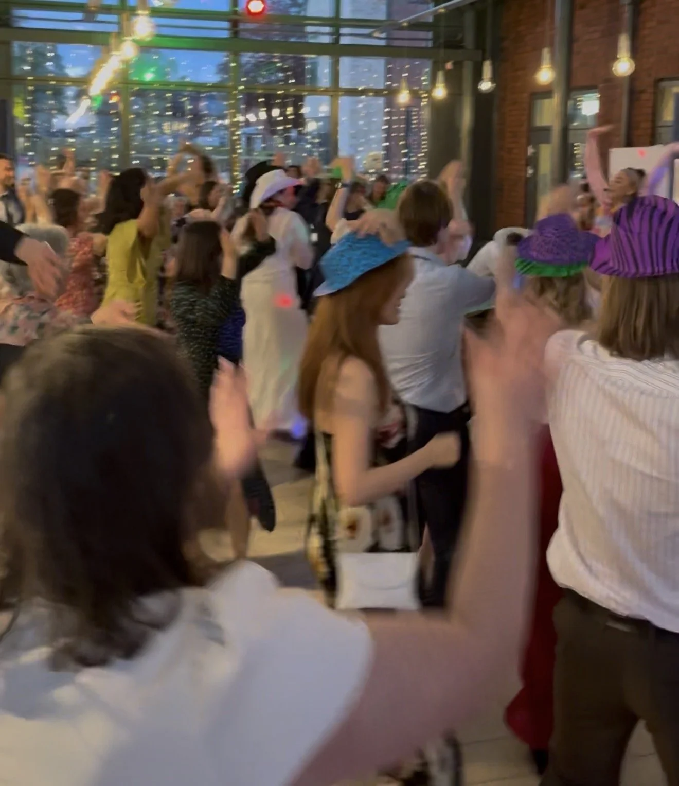 Dance party host leading a group wedding reception dance in Oxford