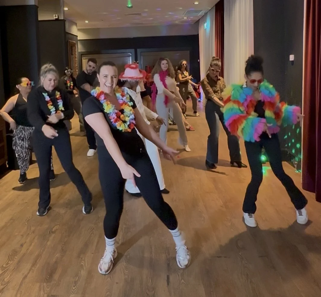 Feel good uplifting line dance class with Dazzle Dance Experience dancing to Puff Daddy fun group dance fitness activity