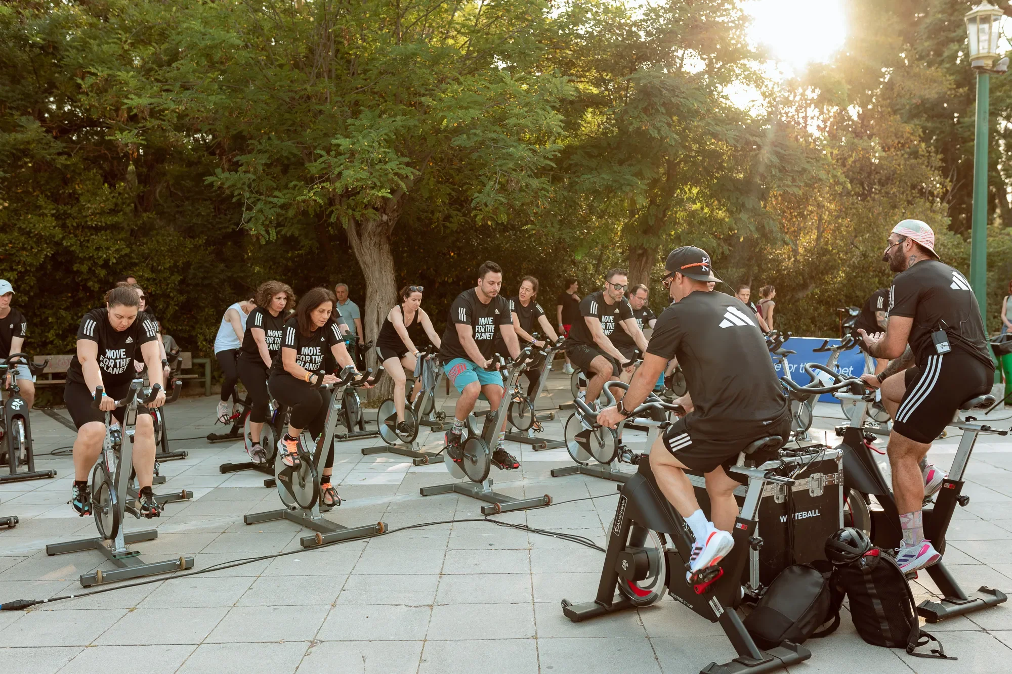 Group of people take a cycling course outdoor during Move For The Planet event
