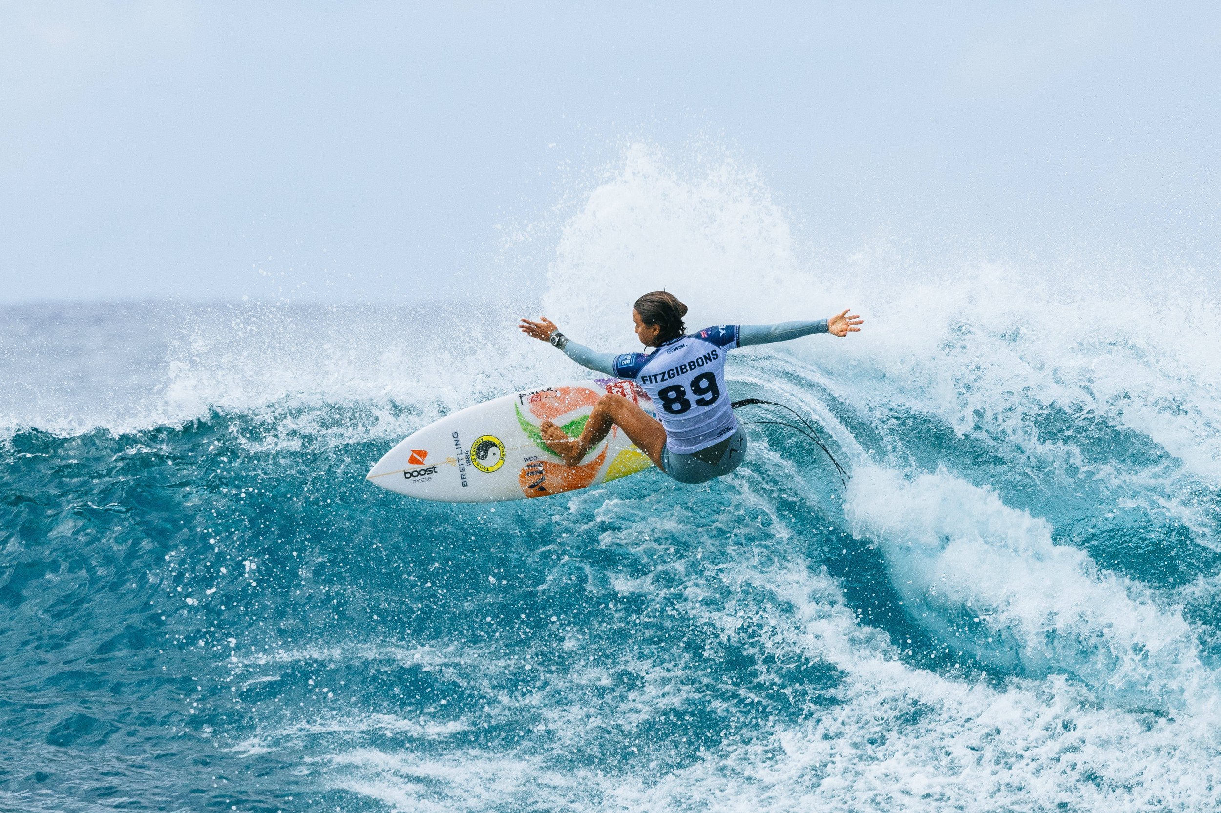 The purposeful surfer Sally Fitzgibbons catching the wave