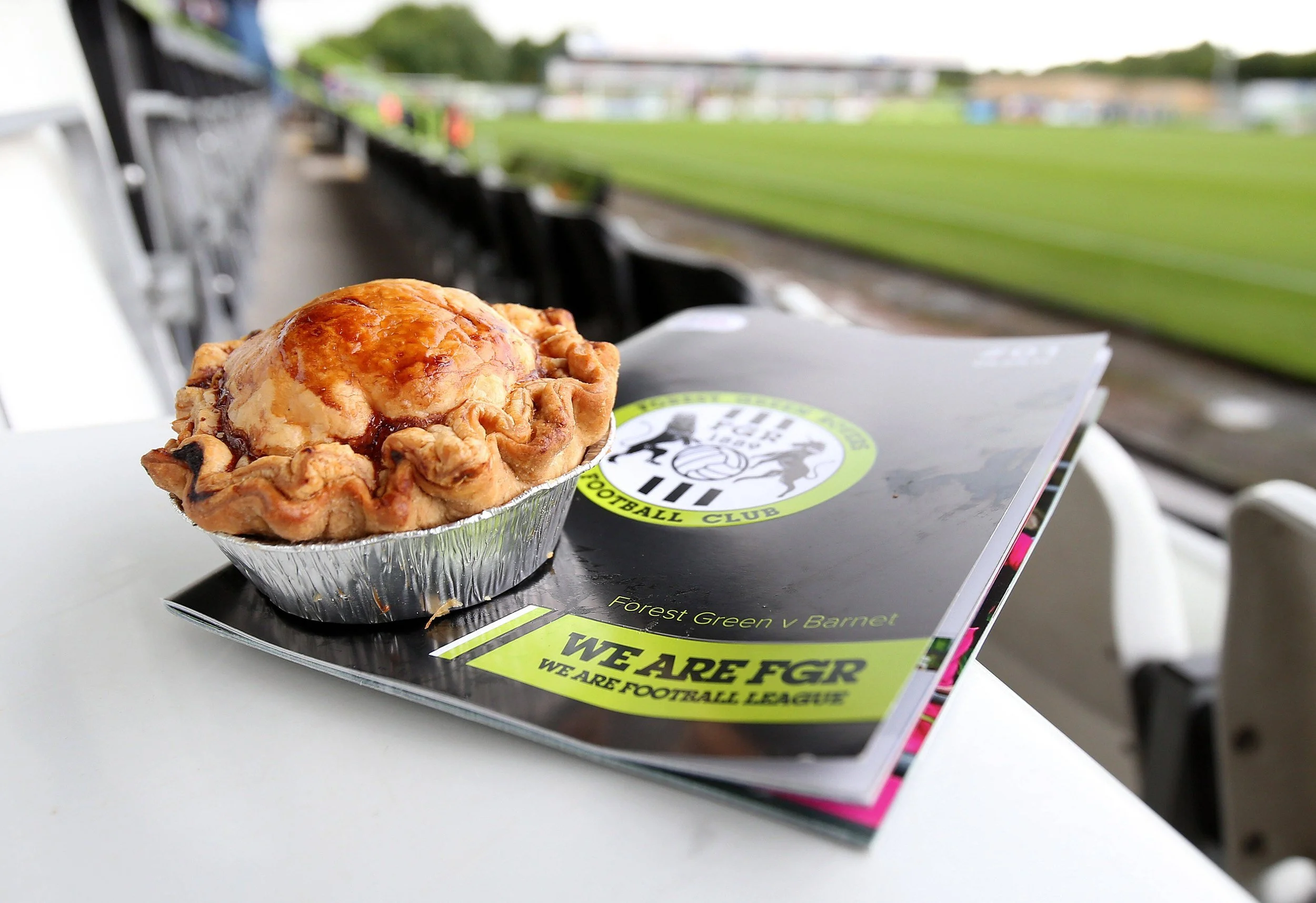Vegan dessert placed above Forest Green Rover magazine at the stadium