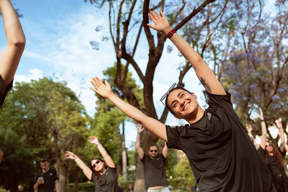 A girl smile while making stretching exercises 