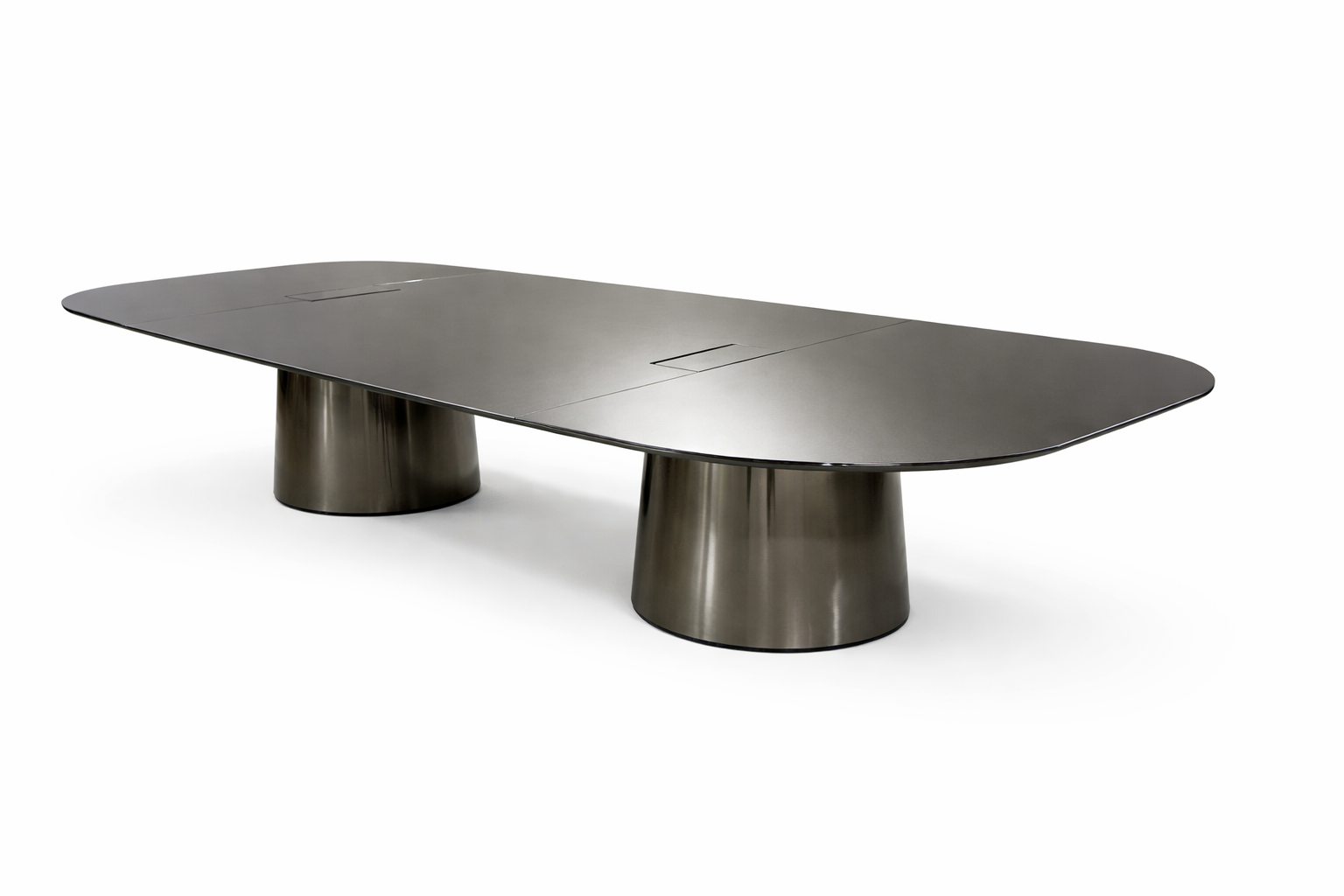 Modern rectangular table with a dark surface and metallic, cone-shaped legs against a white background.