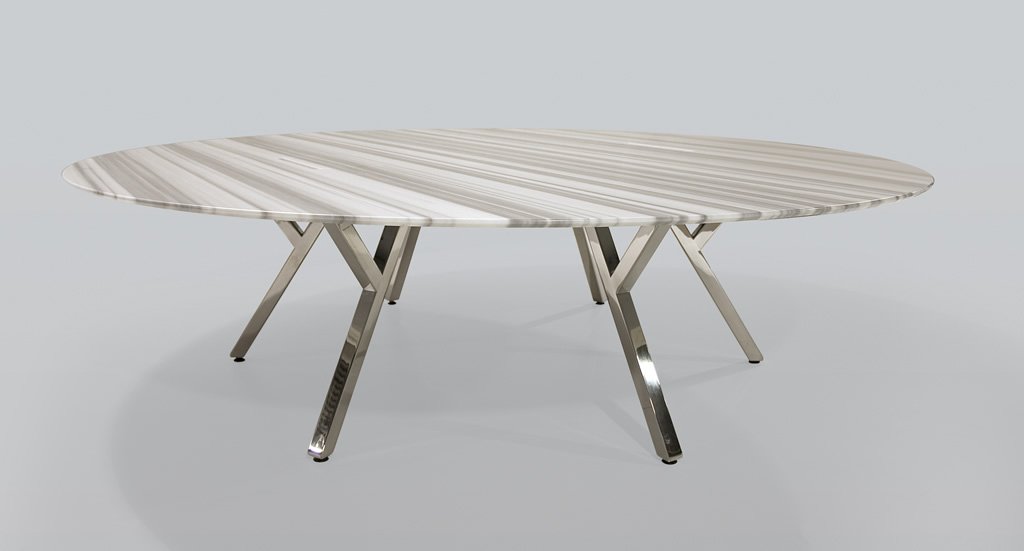 Natural stone marble round tabletop 2Merge collaborative and cafe table with chrome base.