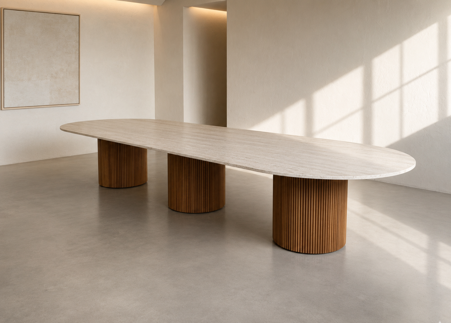 Large Drum table with natural stone racetrack tabletop and three Drum bases in Tambour.