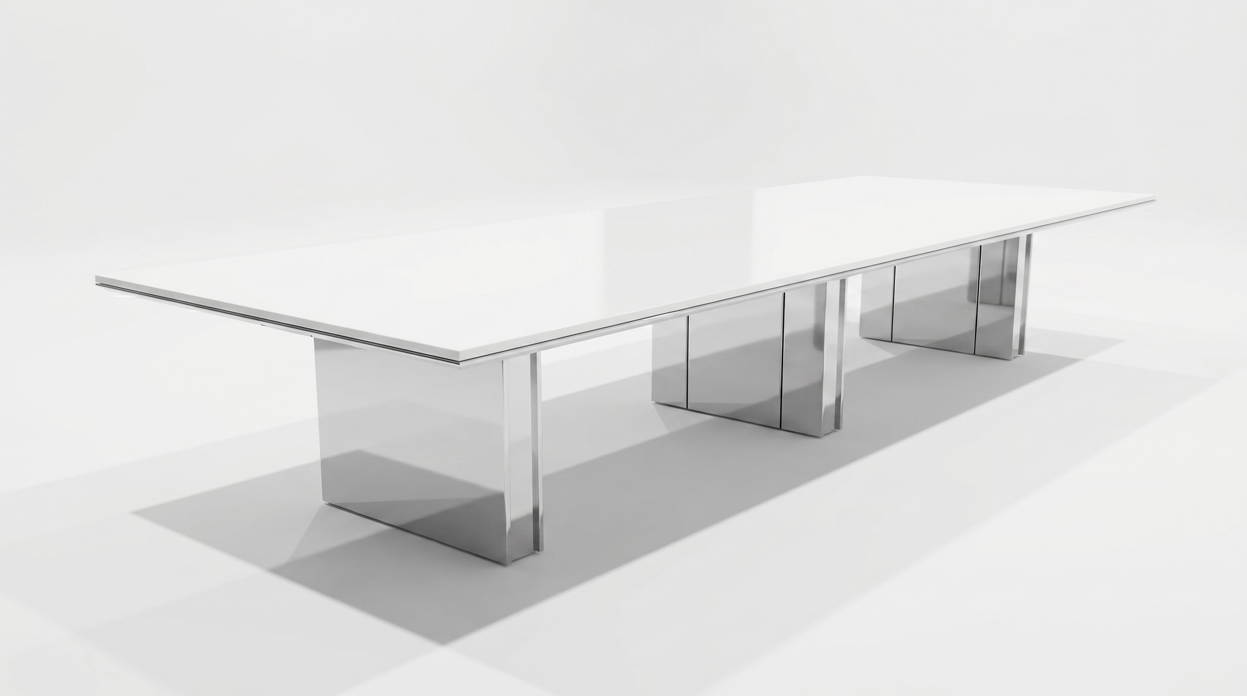 Large polished stainless Panel base conference table.
