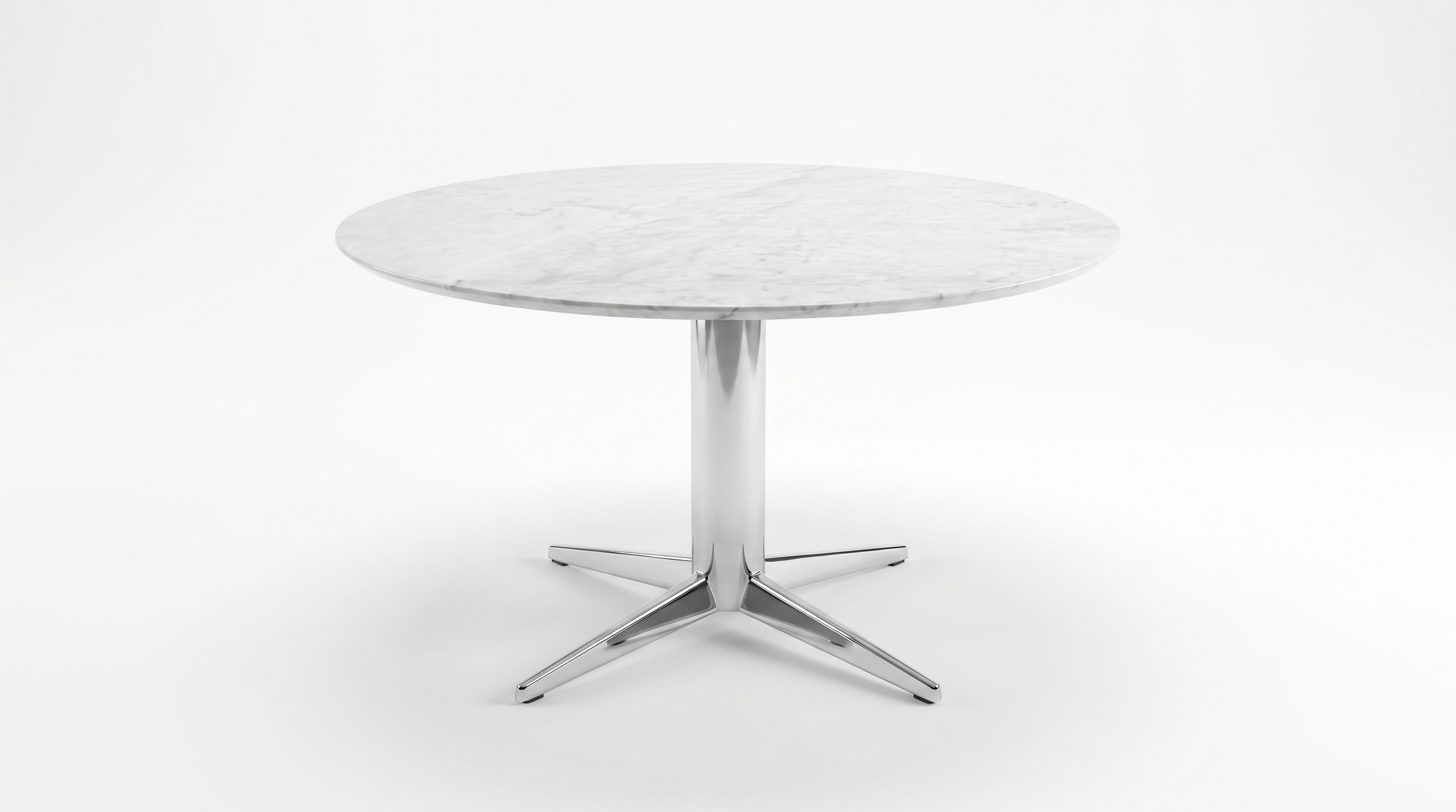 Round Asteri Collaborative table with natural stone tabletop and chrome base.