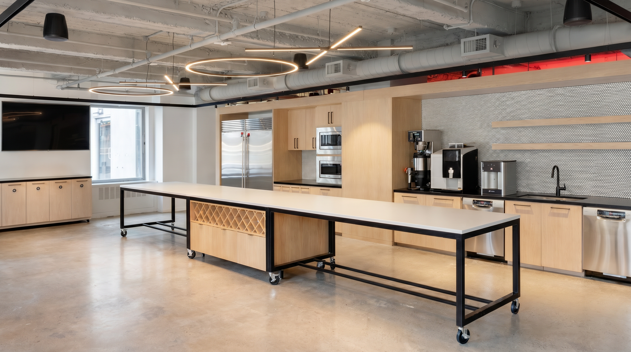 Long mobile Parsons table with white tabletop and black base.