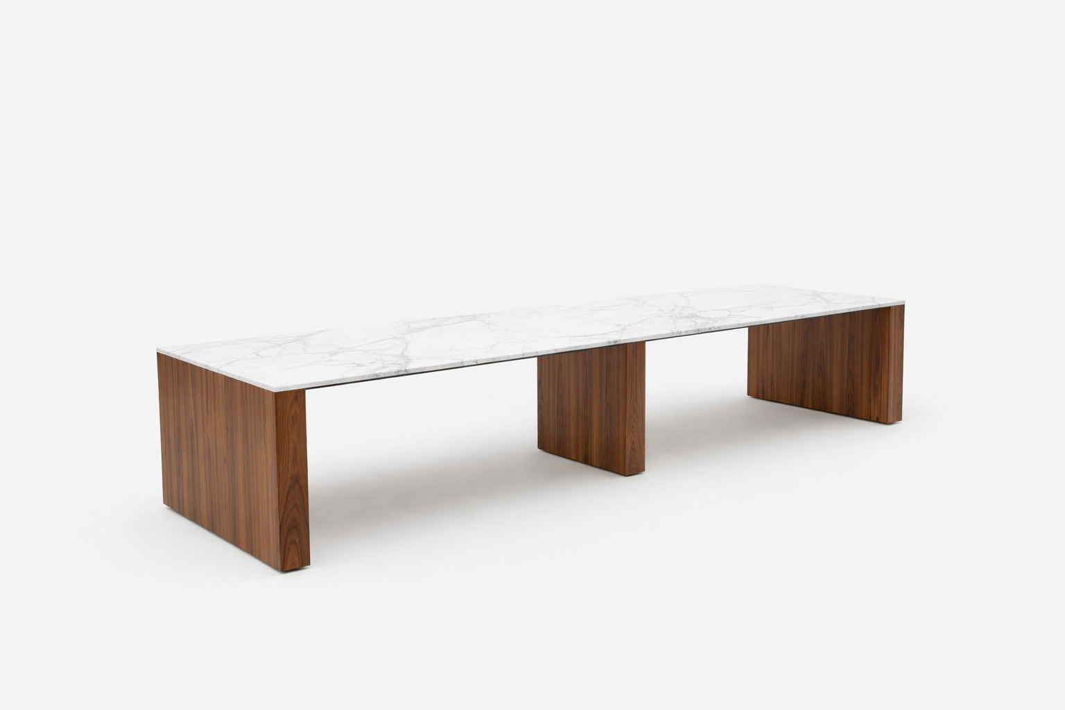 Brooklyn Community table with stone table top and walnut wood veneer side panels.