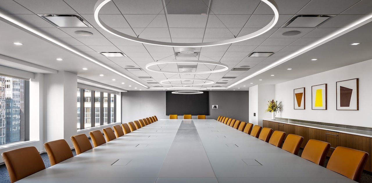Long conference room table with electric and communication options