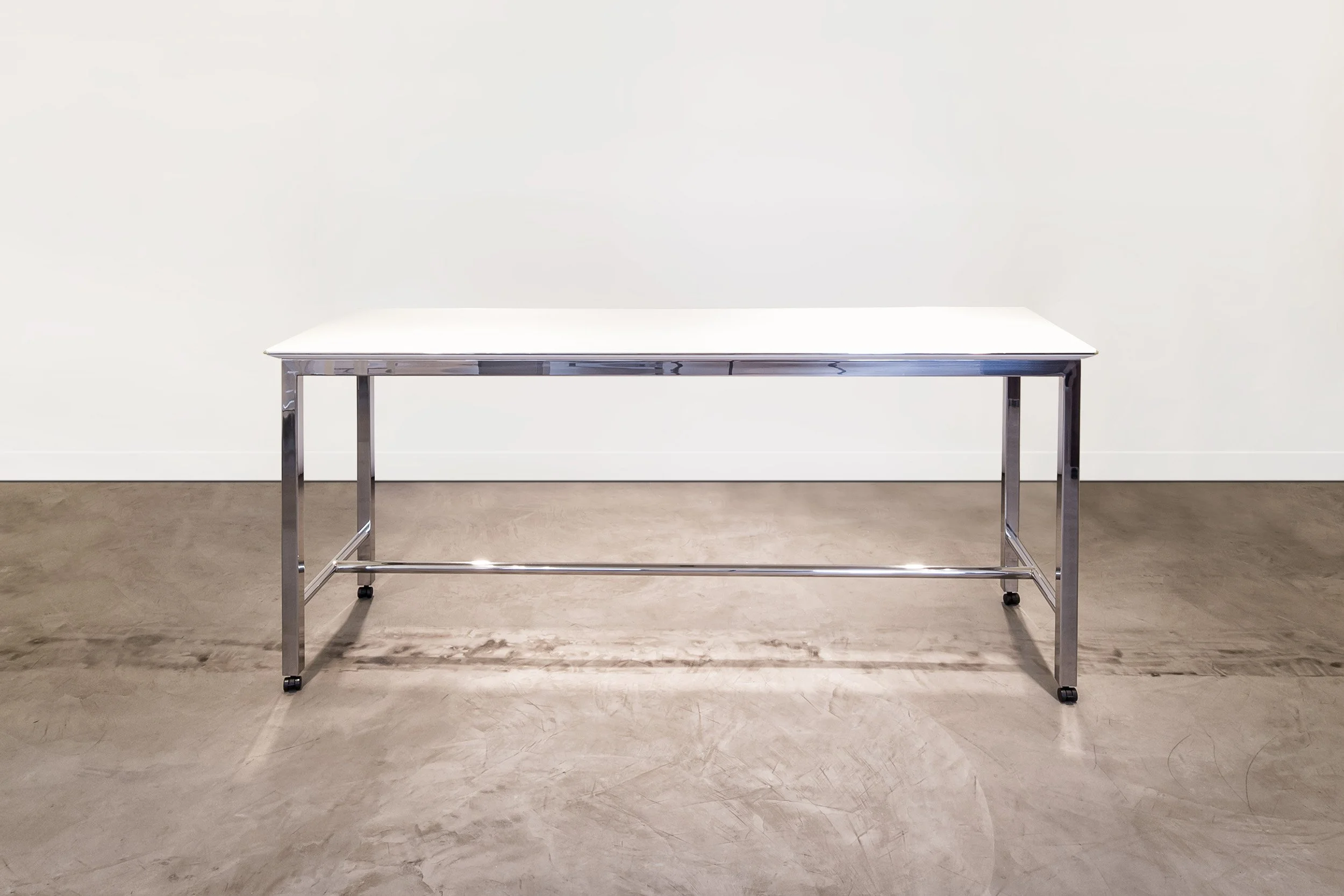 Mobile Parsons Bar Height Table with white tabletop and chrome base.
