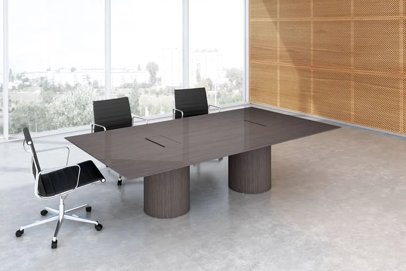 Rectangle Drum conference room table with wood veneer tabletop and matching wood veneer bases.