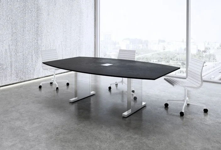 Modern conference room with a black table and three white chairs with wheels, large windows showing a cityscape.