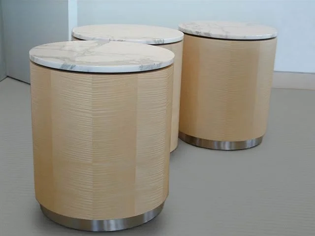 Round marble stone single drum cafe tables with wood veneer base.
