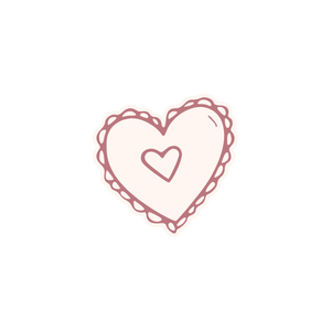 A doodle of a heart with a smaller heart inside, decorated with lace-like details around the edges.