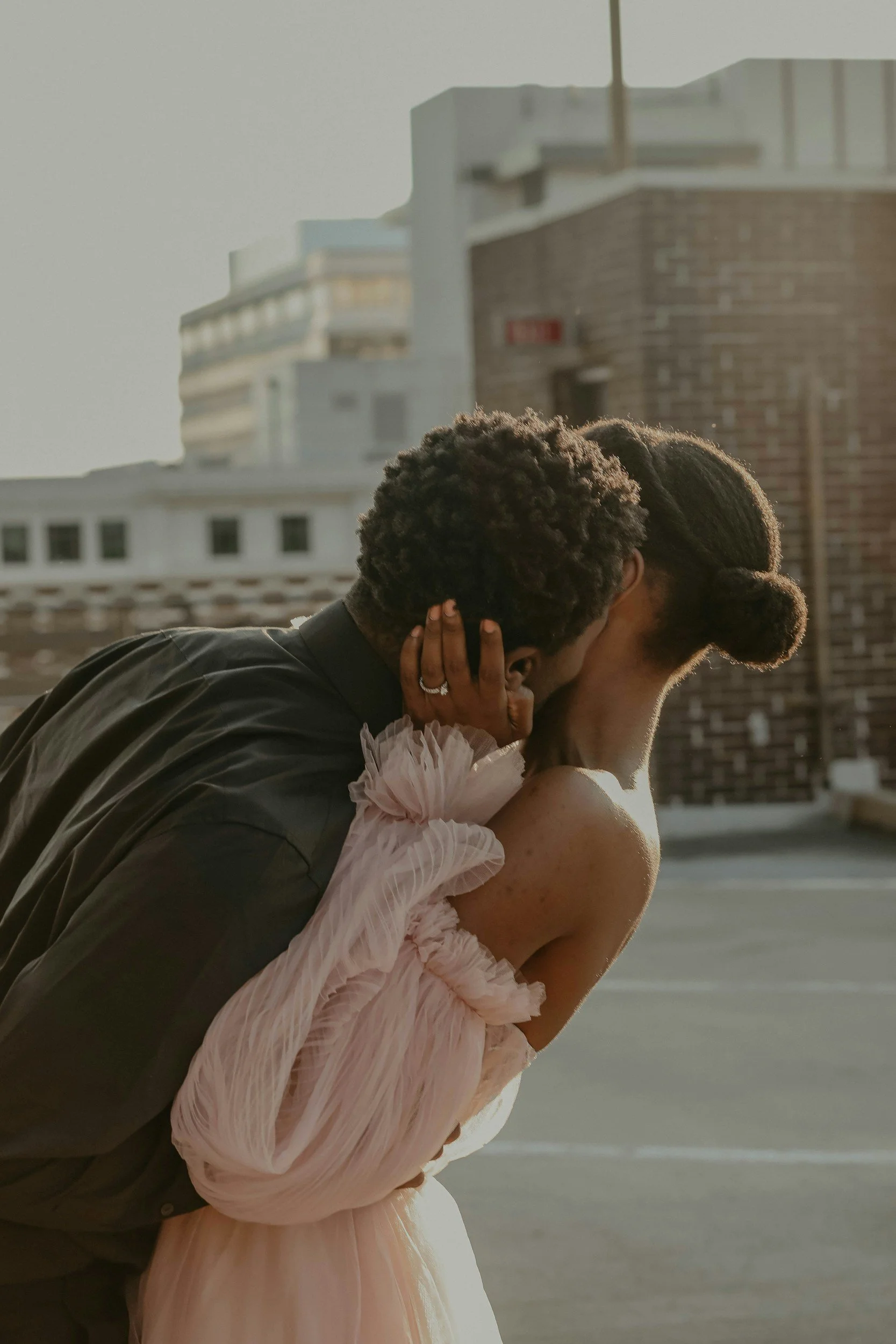 A couple hugging after online couples therapy in Maryland.