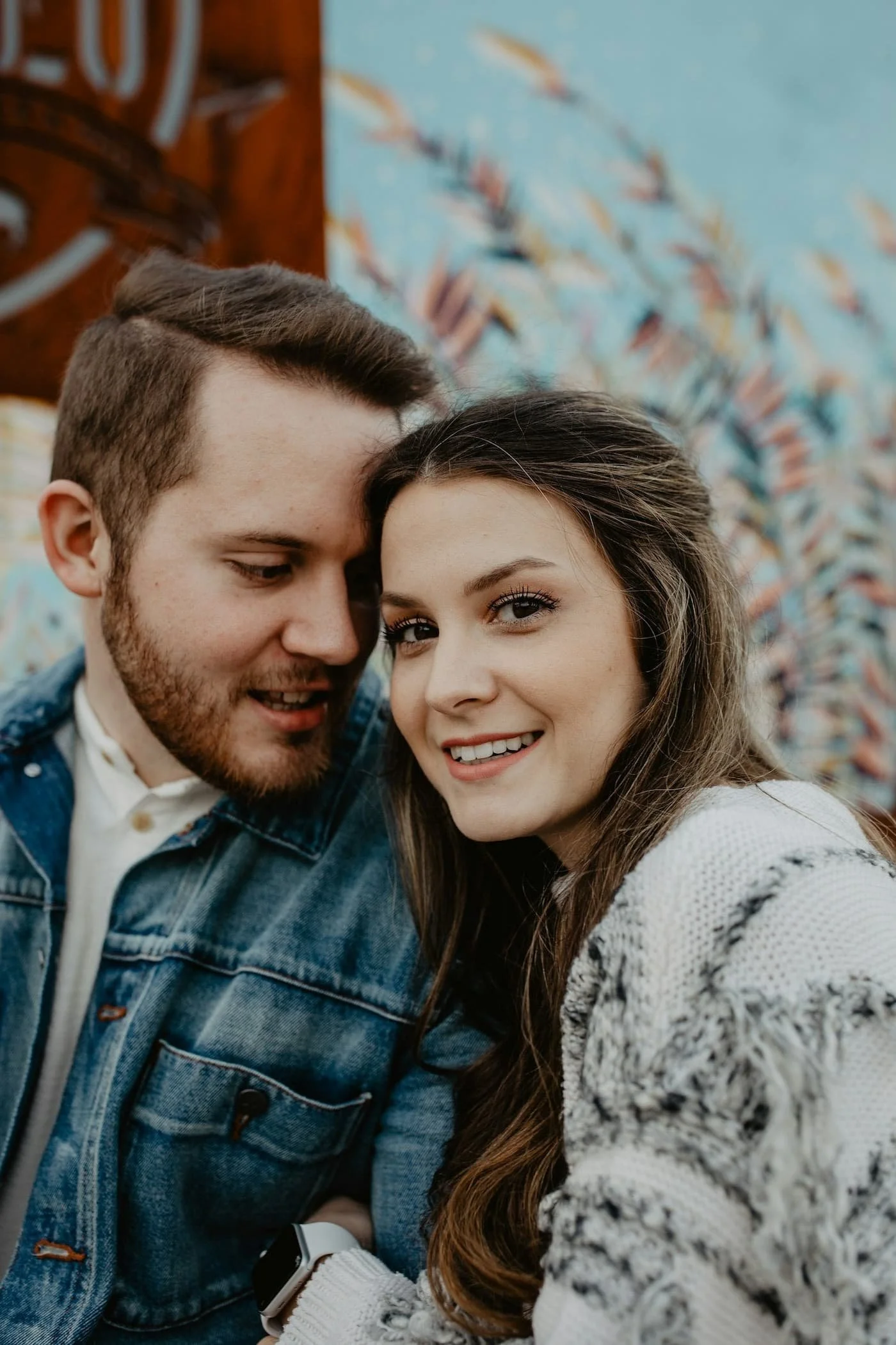 A couple embracing after online couples therapy in Maryland.