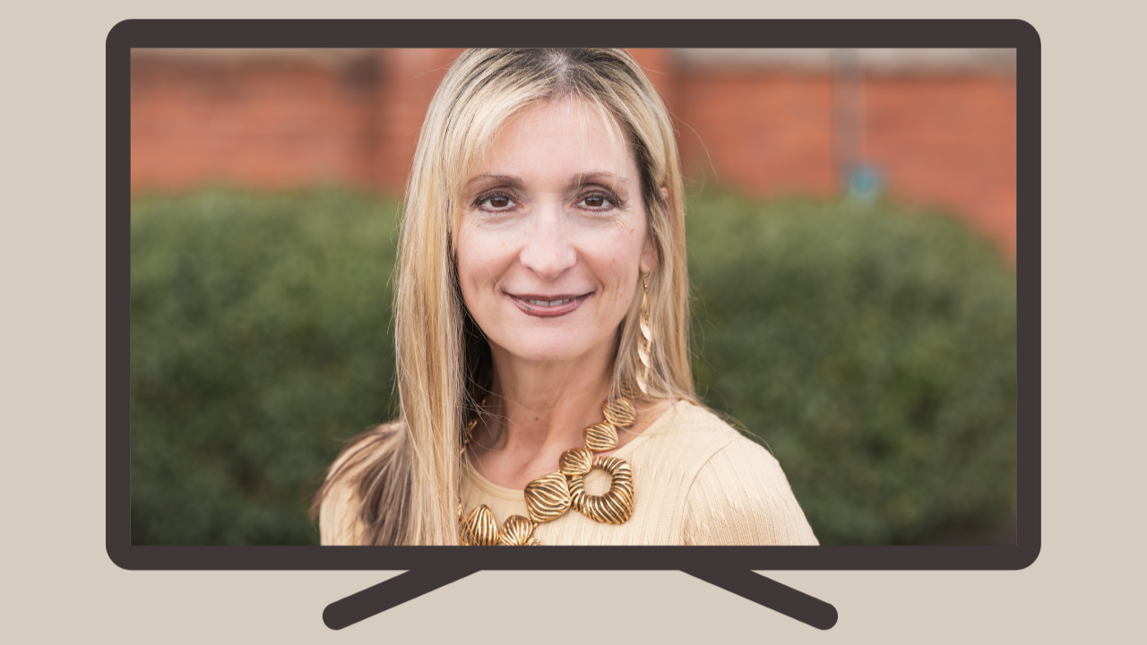 Dr. Trish Schneider smiling outdoors, integrative psychiatric nurse practitioner specializing in functional mental health for women.