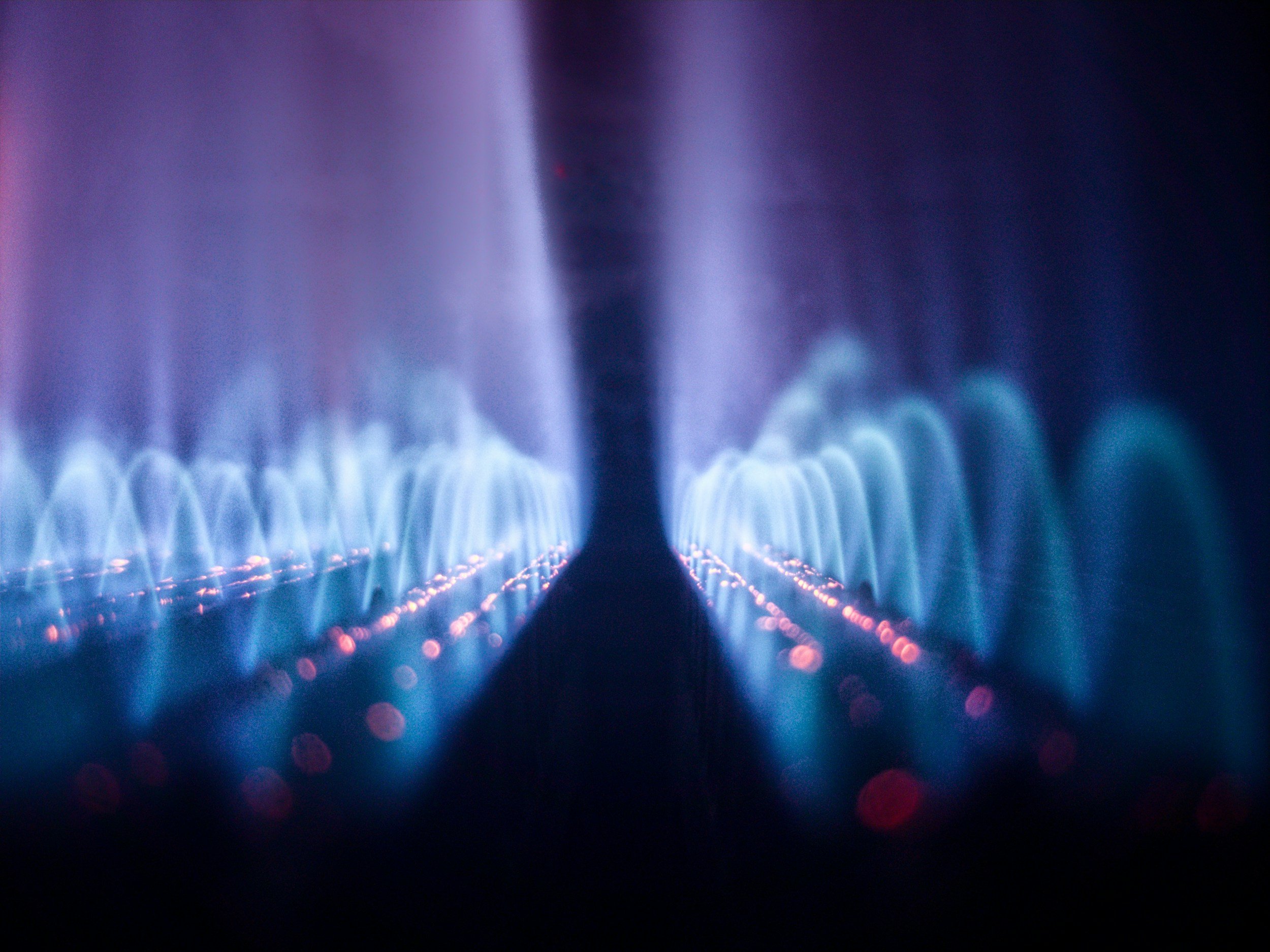 Close-up of a blue and purple gas flame.