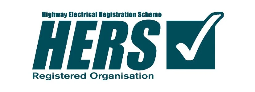 Logo of HERS, the Highway Electrical Registration Scheme, with a checkmark symbol.