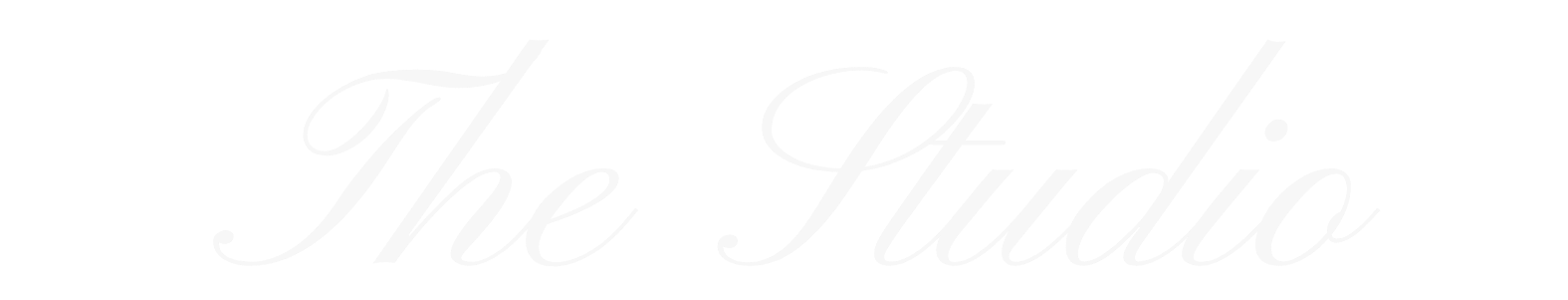 Text reading 'The Studio' in elegant white script on a black background.