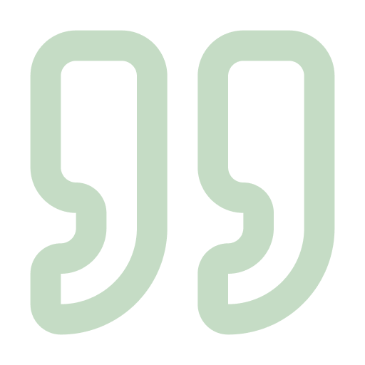 Green quotation marks on a black background.