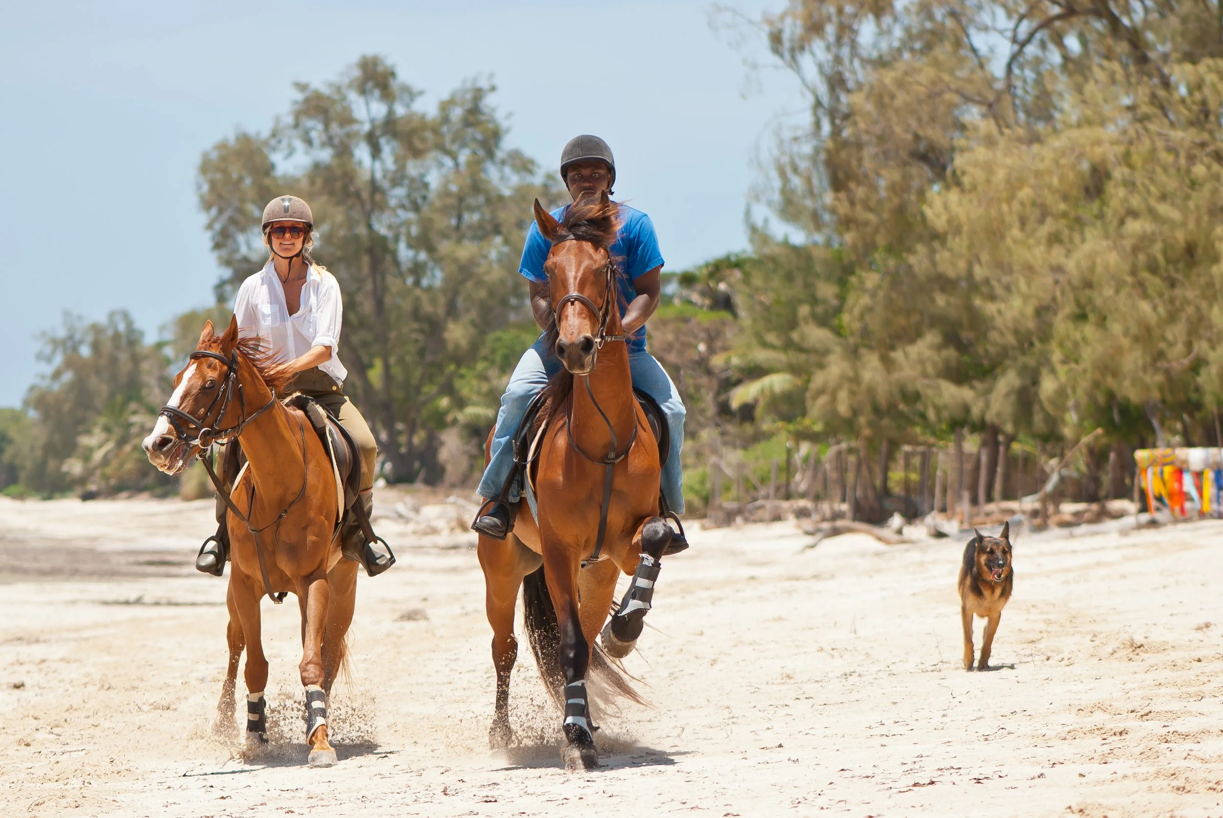 Kinondo Kwetu Hotel Horseriding on the beach.jpg