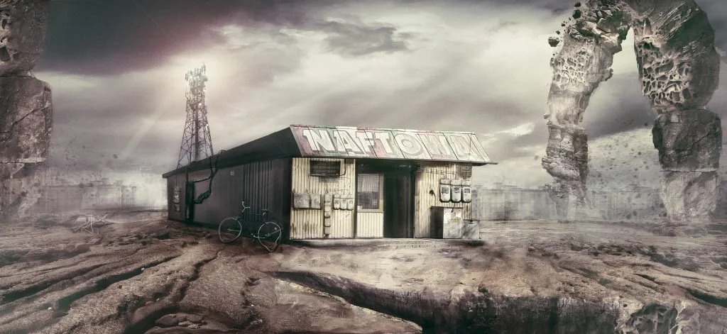 A desolate landscape with a small, rundown building labeled 'NATOINU', a bicycle leaning against it, and a large stone arch in the background, under a dark, cloudy sky. Concept art made by Karolina Skorek