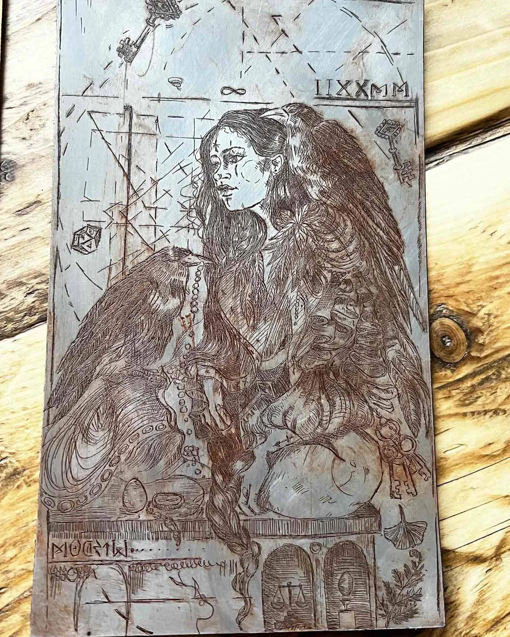 A detailed sketch of a woman with long hair, wearing elaborate clothing and jewelry. She is holding a serpentine staff or object, and has a calm, confident expression. The background includes symbolic elements such by Karolina Skorek 